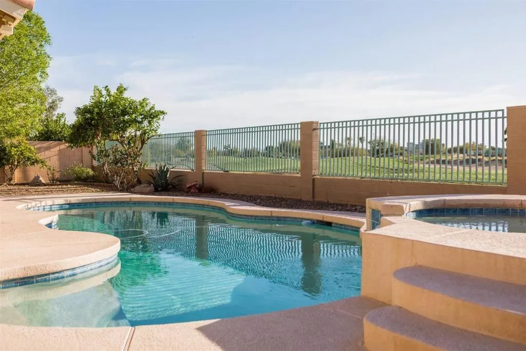 Spacious golf course house with pool heater, spa