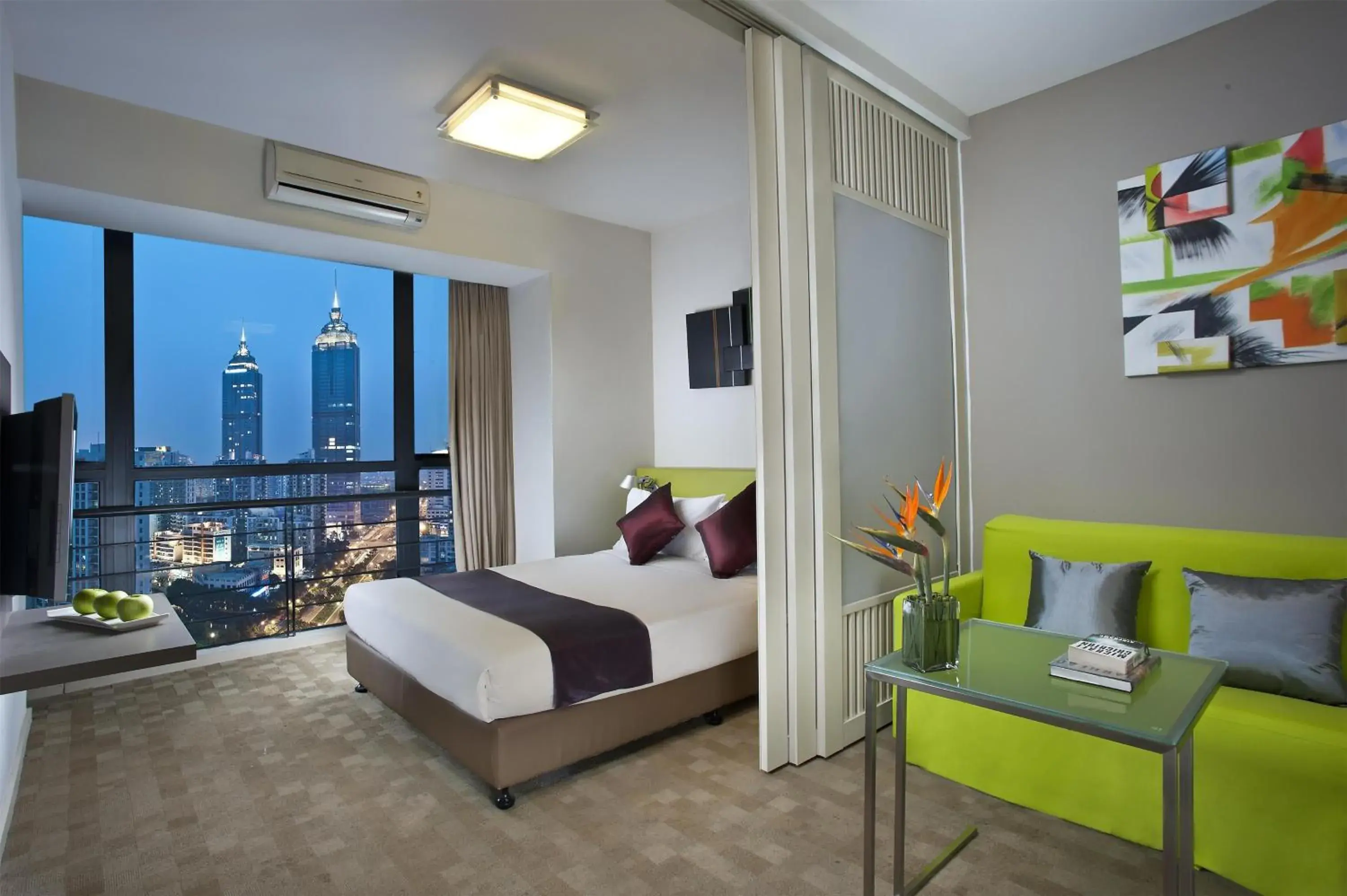 Photo of the whole room, Bed in Citadines Xinghai Suzhou Photo of the whole room, Bed in Citadines Xinghai Suzhou