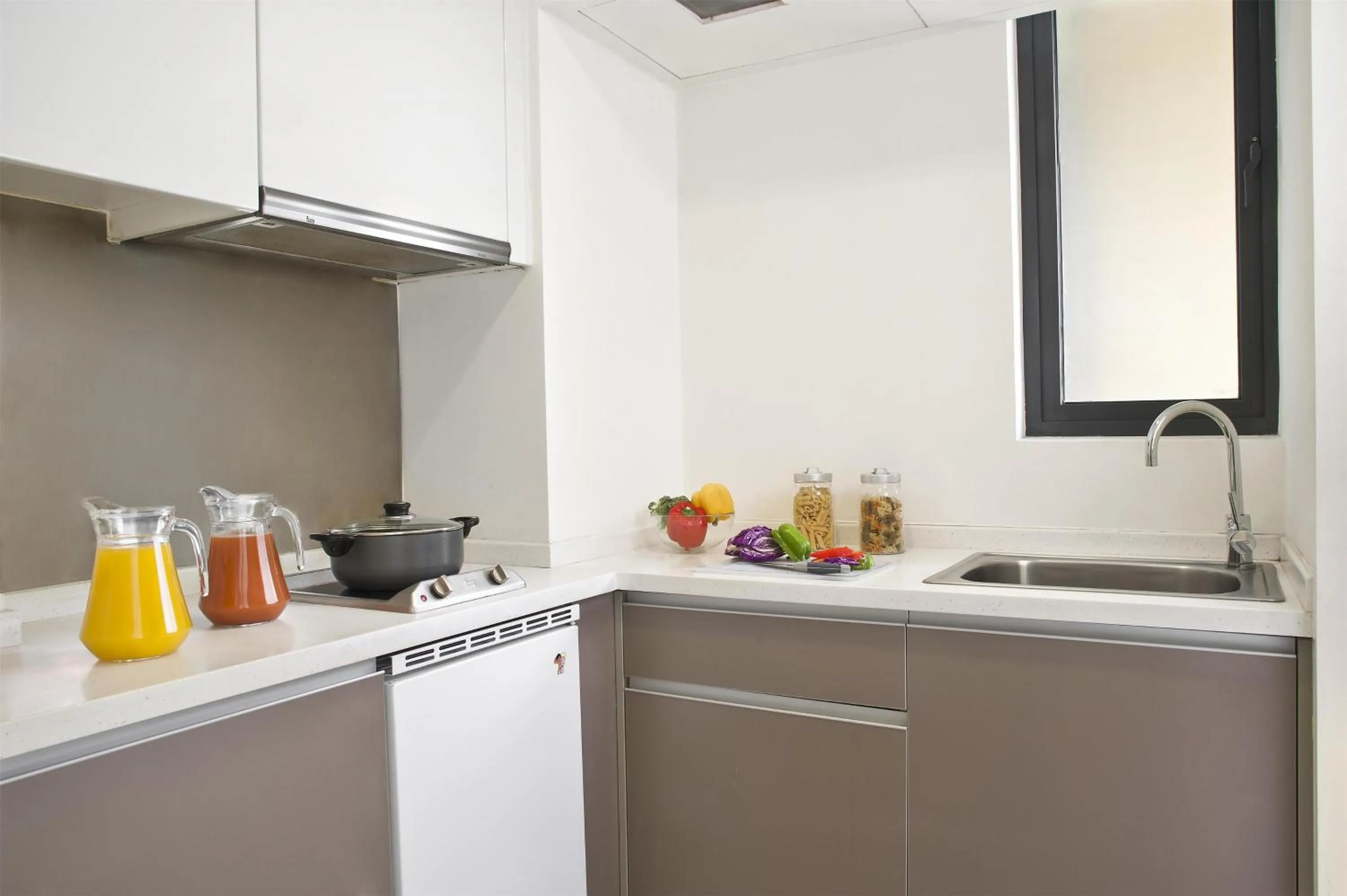 Kitchen or kitchenette in Citadines Xinghai Suzhou
