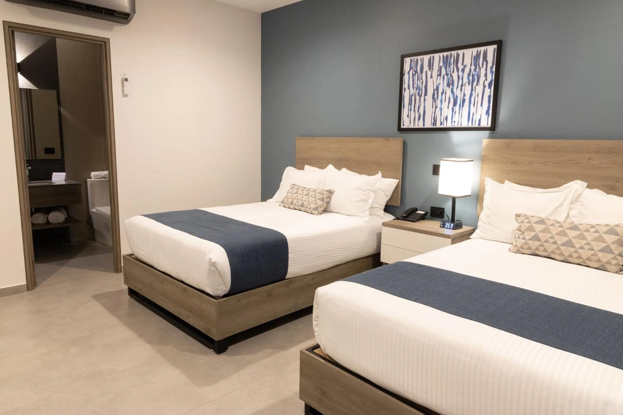 Bed in TH HOTEL & VIVIENDA