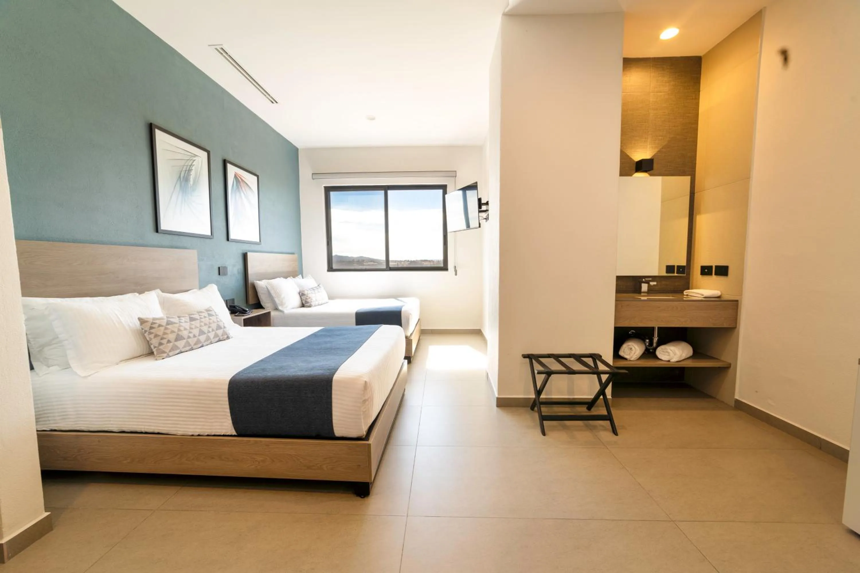 Photo of the whole room, Bed in TH HOTEL & VIVIENDA