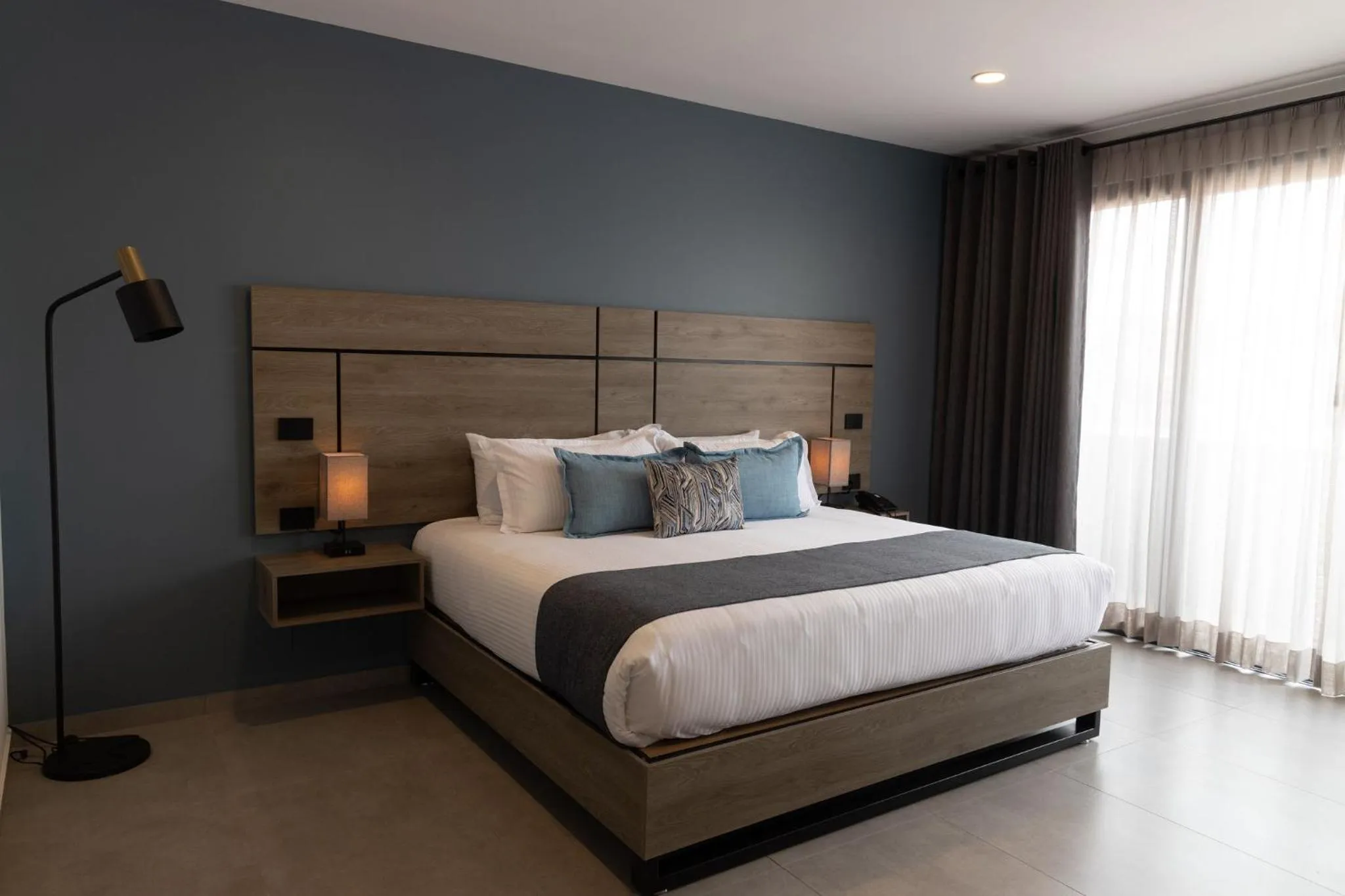 Bed in TH HOTEL & VIVIENDA