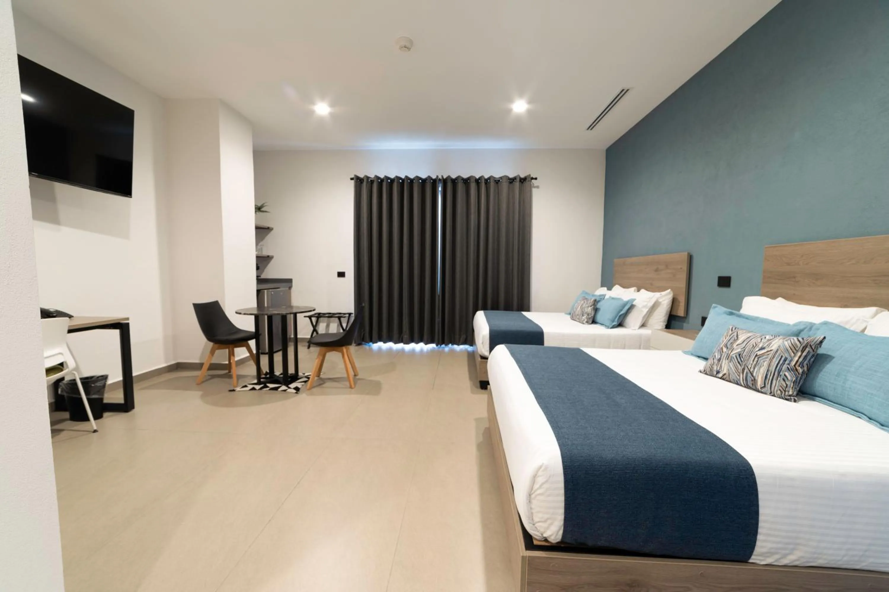 Photo of the whole room, Bed in TH HOTEL & VIVIENDA