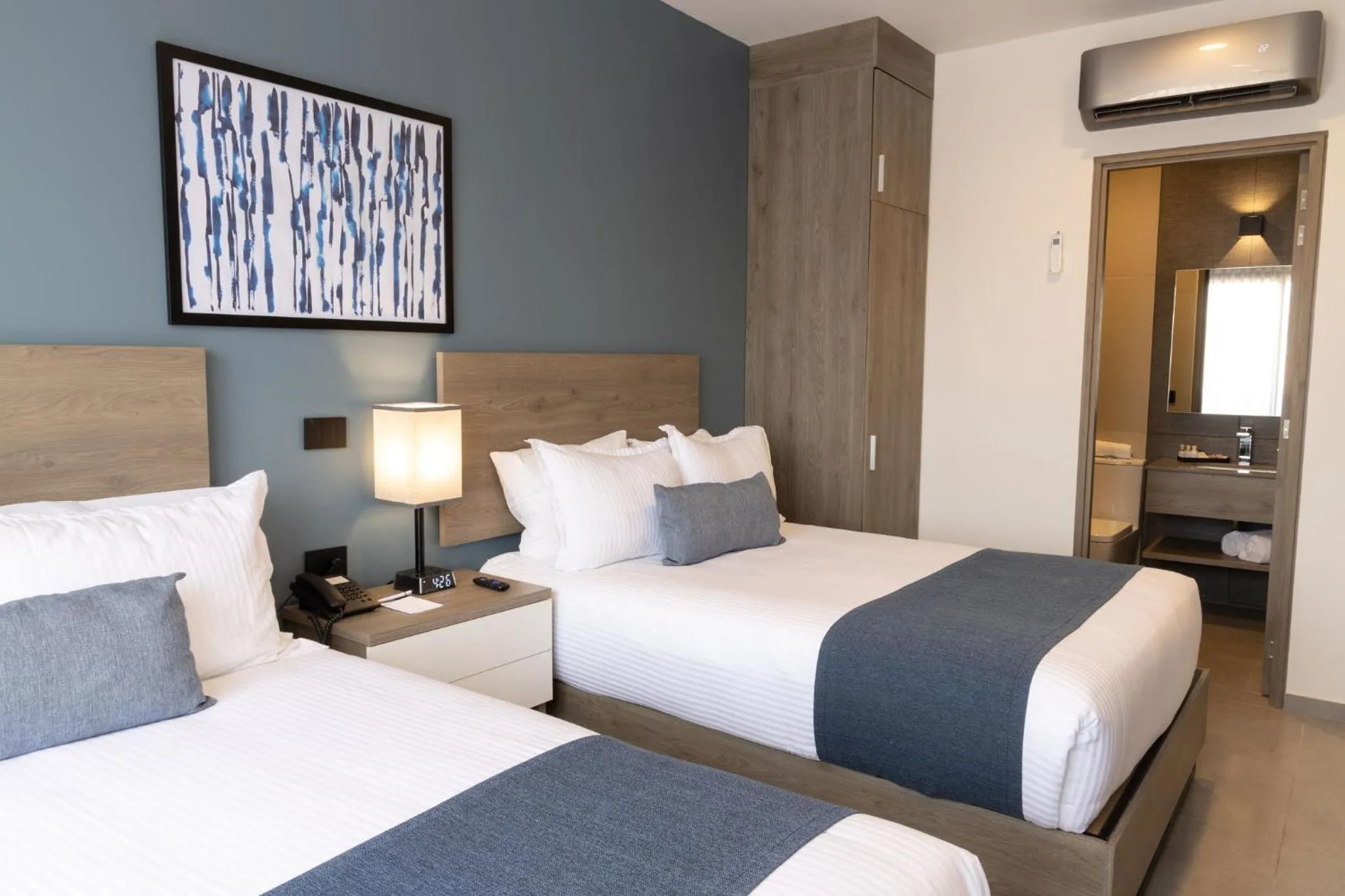 Bed in TH HOTEL & VIVIENDA