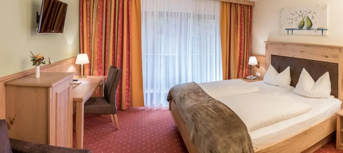 Photo of the whole room, Bed in Landhotel Windlicht