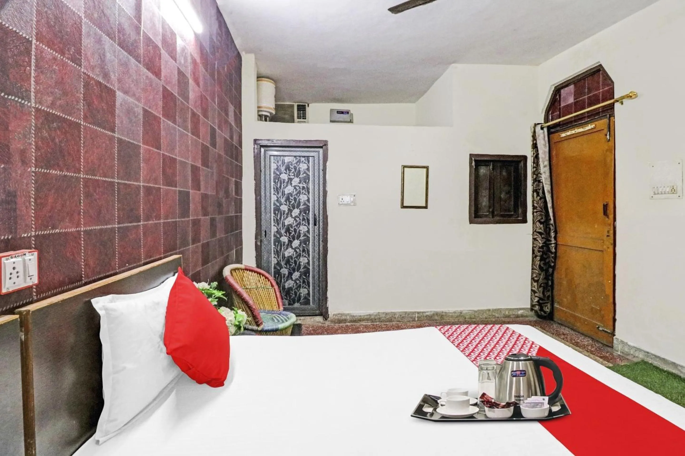 Bedroom in Hotel O Lion Home Stay