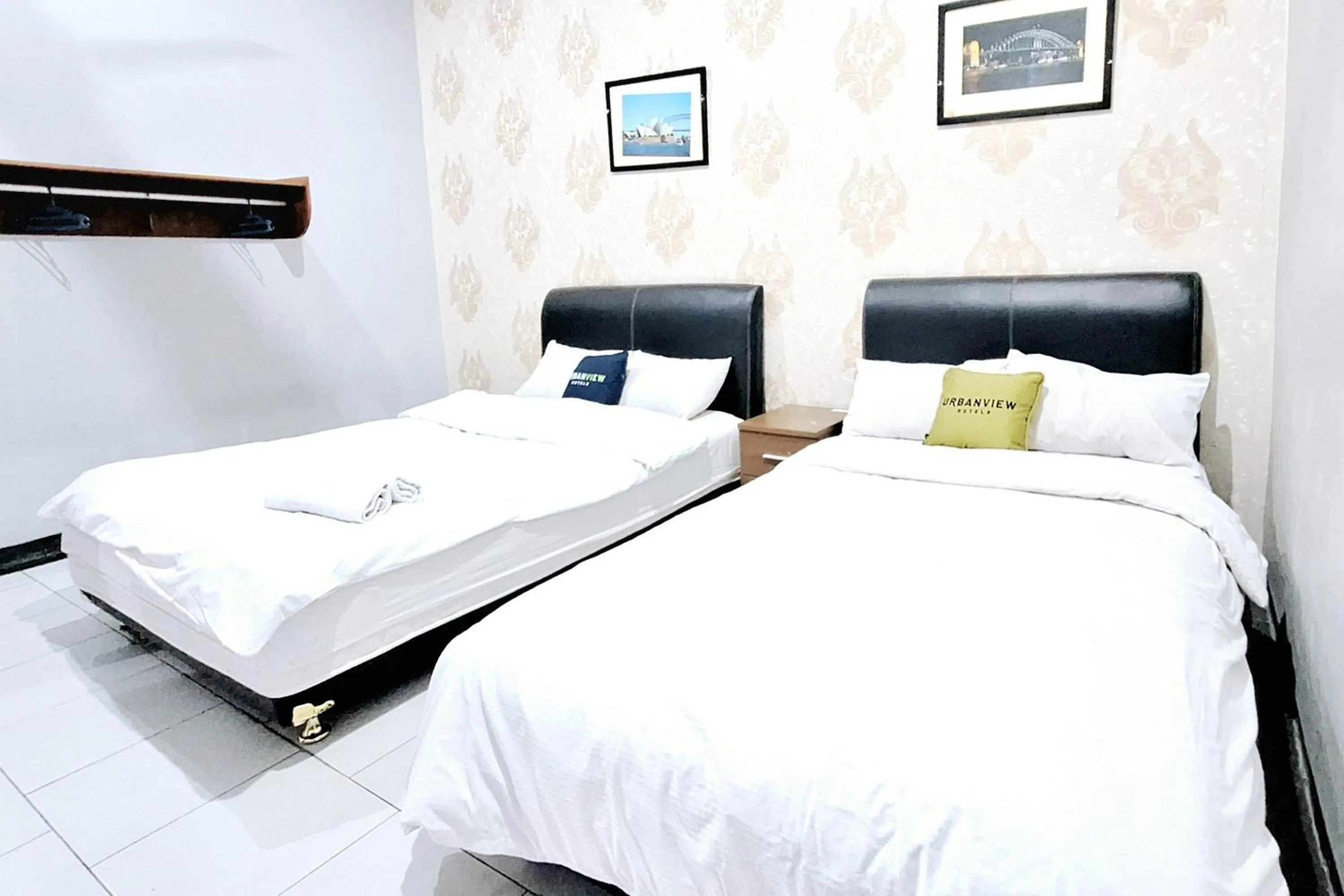 Bedroom, Bed in Urbanview The Halona near Jawa Timur Park 4