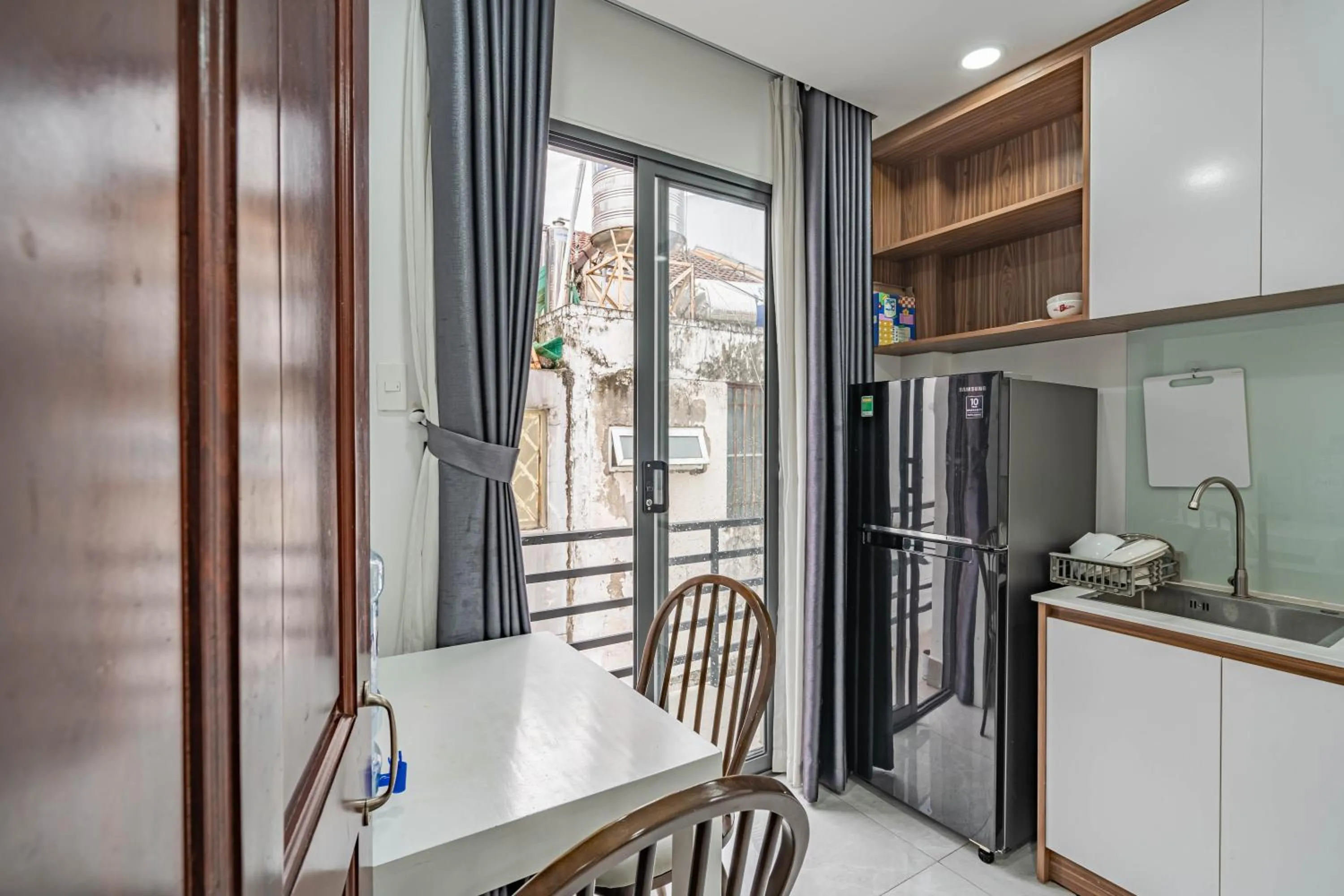 Kitchen or kitchenette in Spring Hill Apartment -The High Class