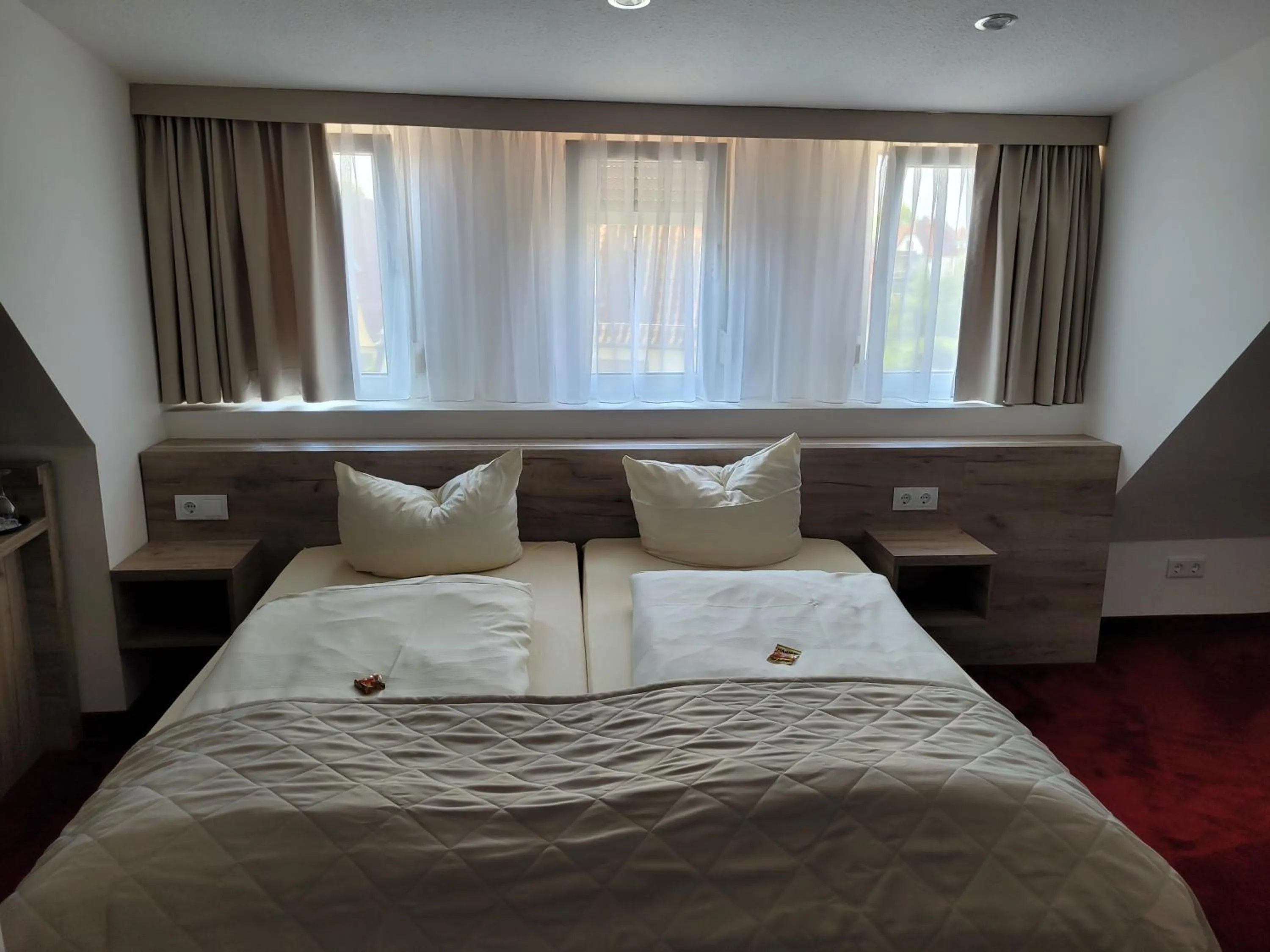 Bed in Hotel Rosengarten