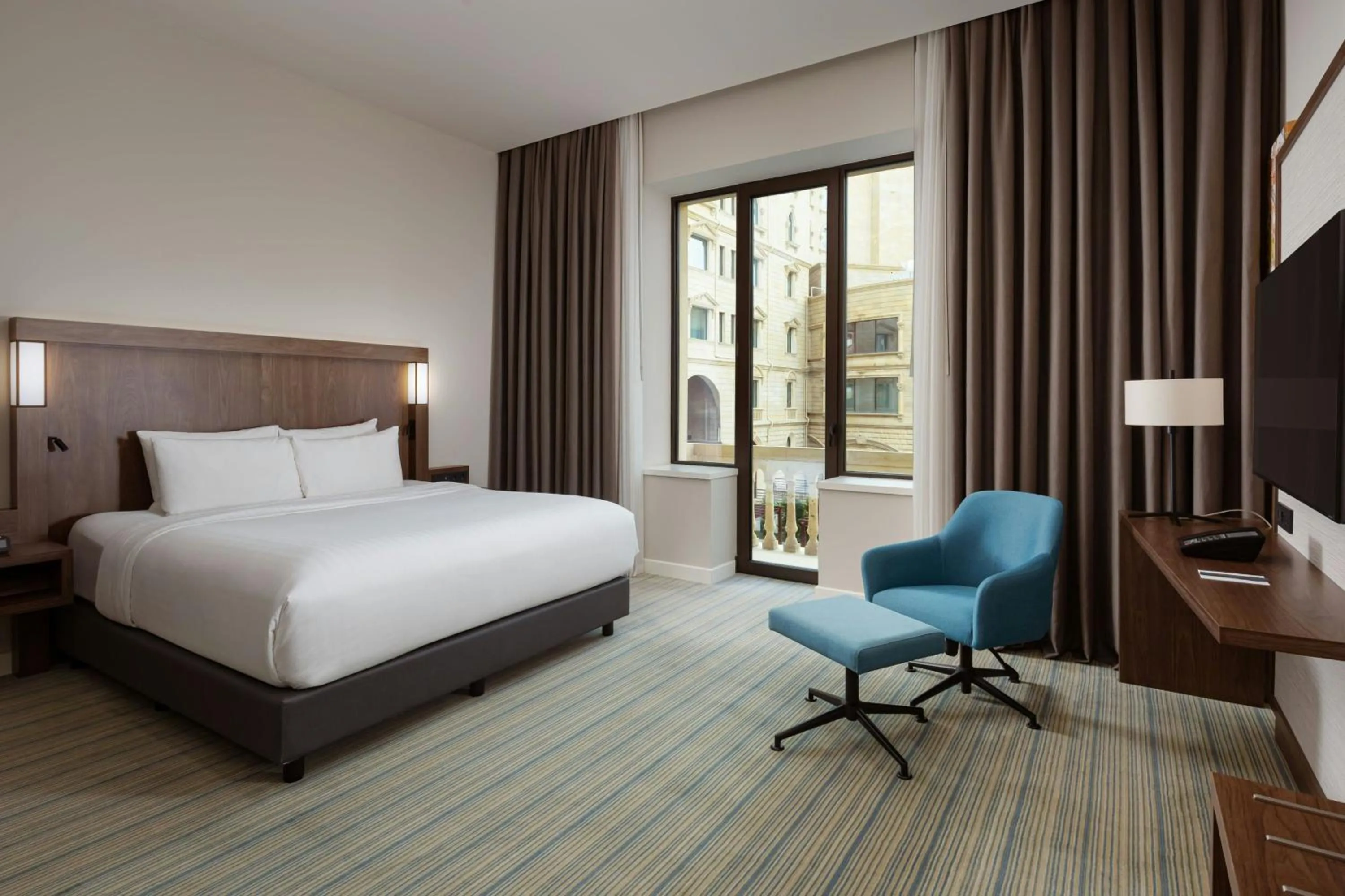 Photo of the whole room, Bed in Courtyard by Marriott Baku
