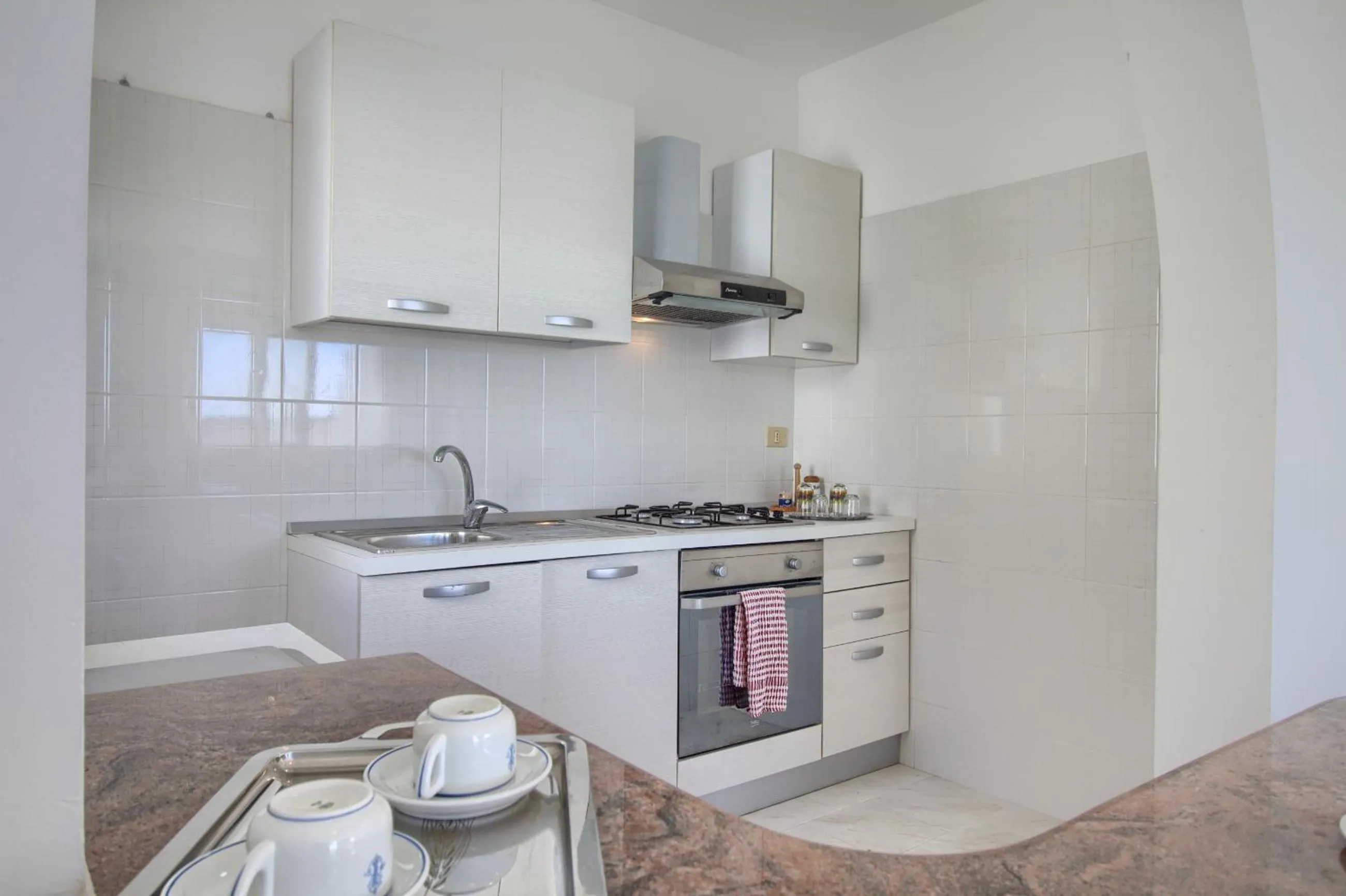 Kitchen or kitchenette in Front Beach Torre Mozza by LoveSud