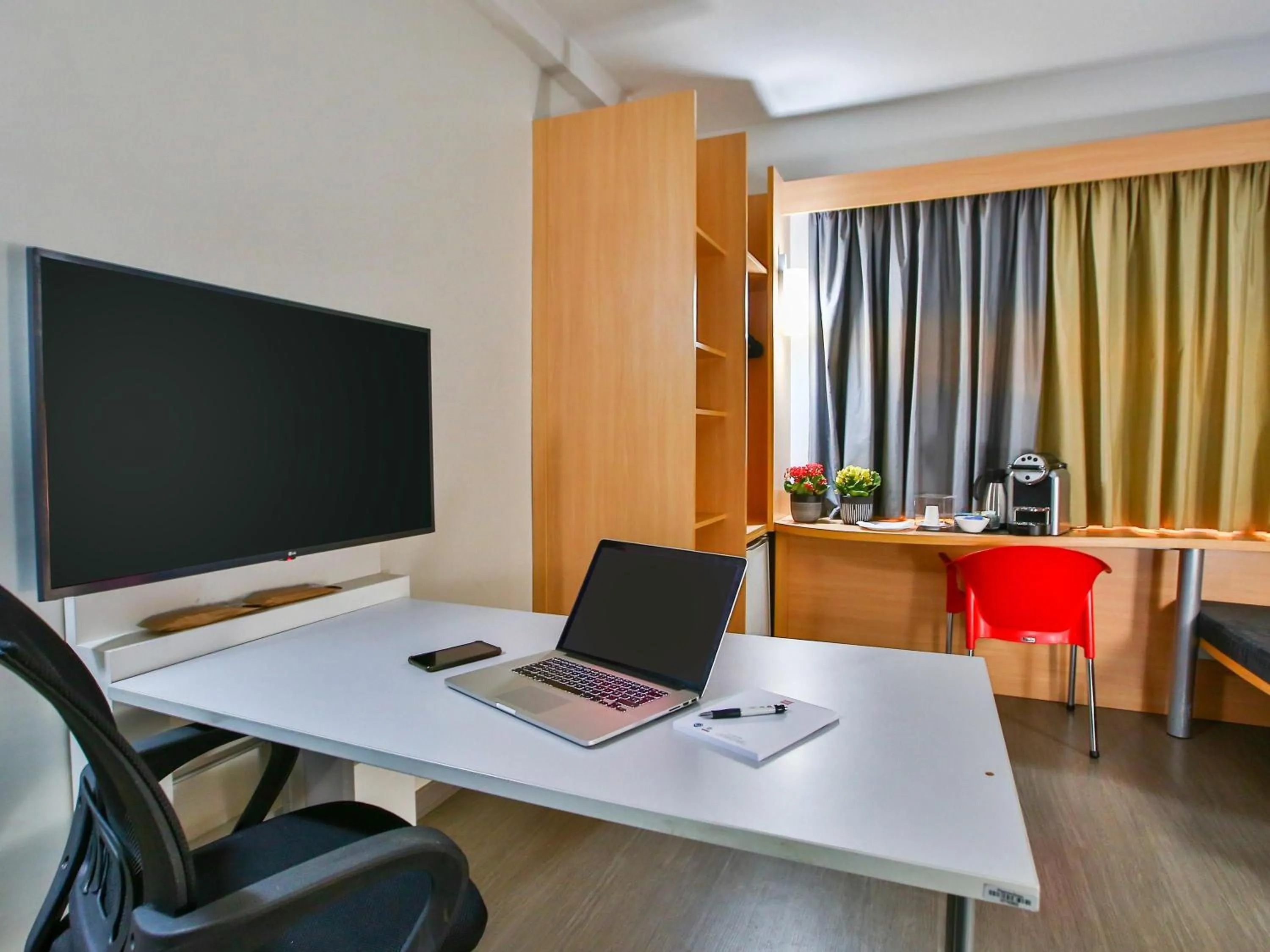Bedroom in ibis Goiânia