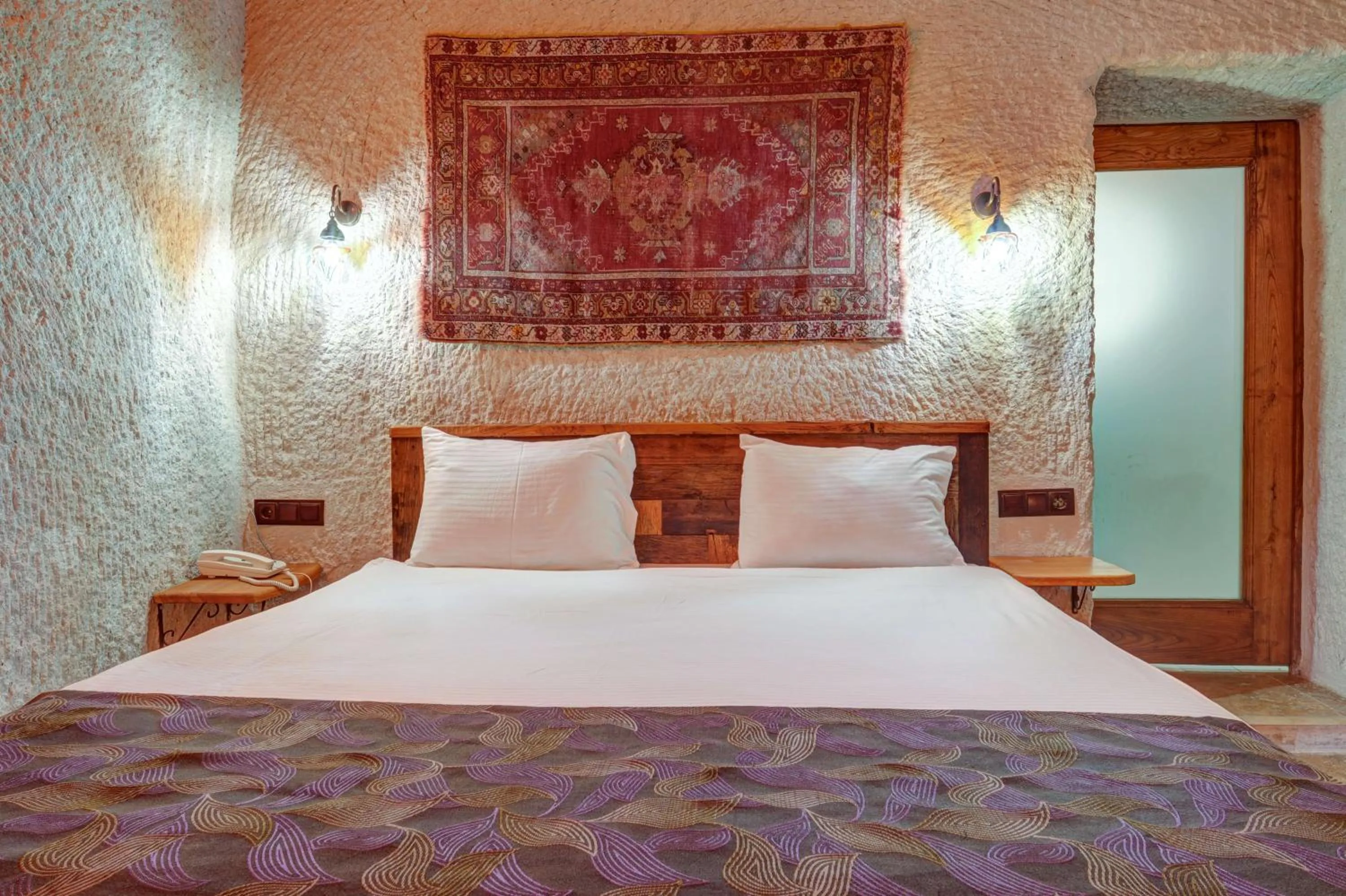 Bed in Avilla Cave Hotel