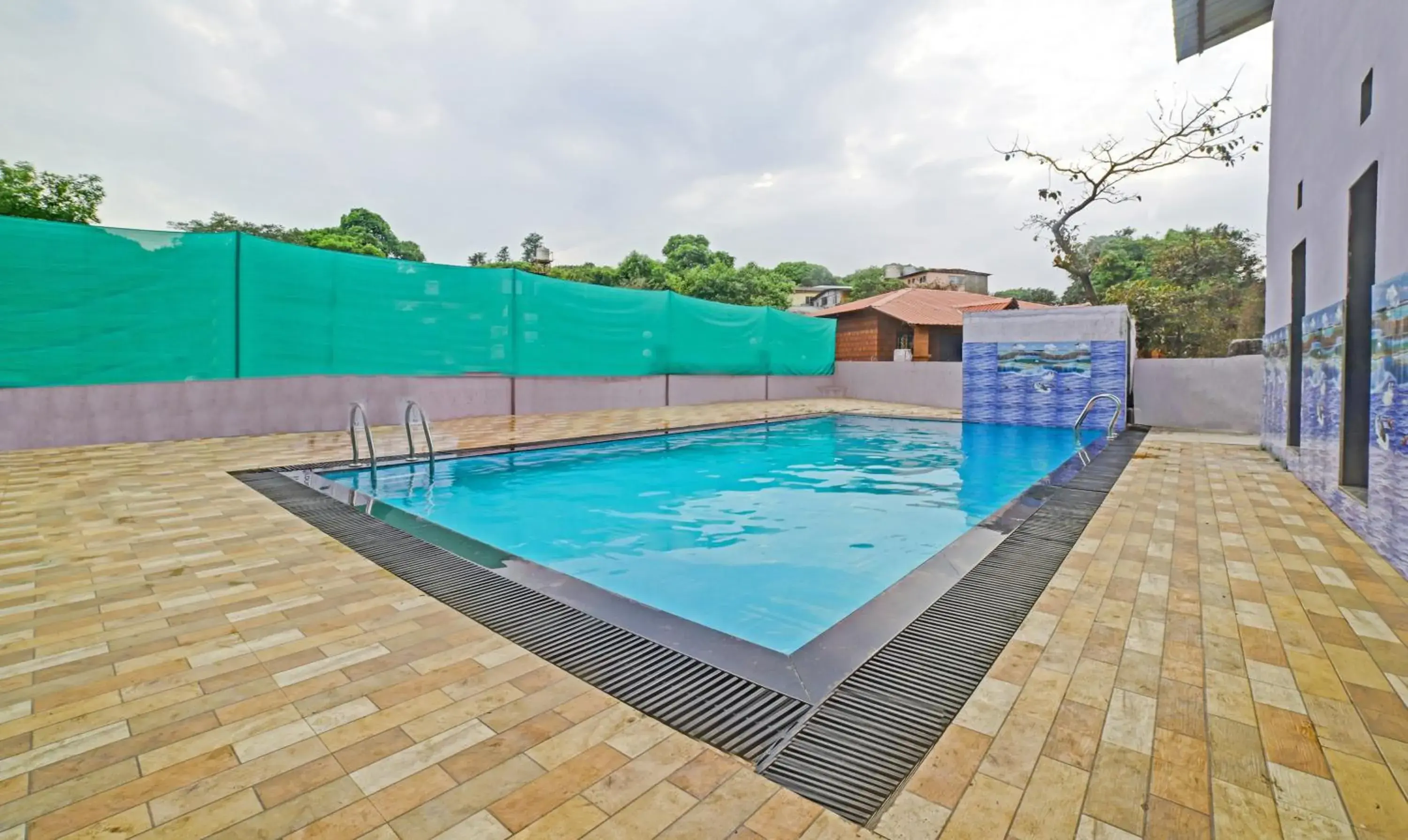 Swimming pool in Treebo Balaji Excellency with Pool & Spa Swimming pool in Treebo Balaji Excellency with Pool & Spa