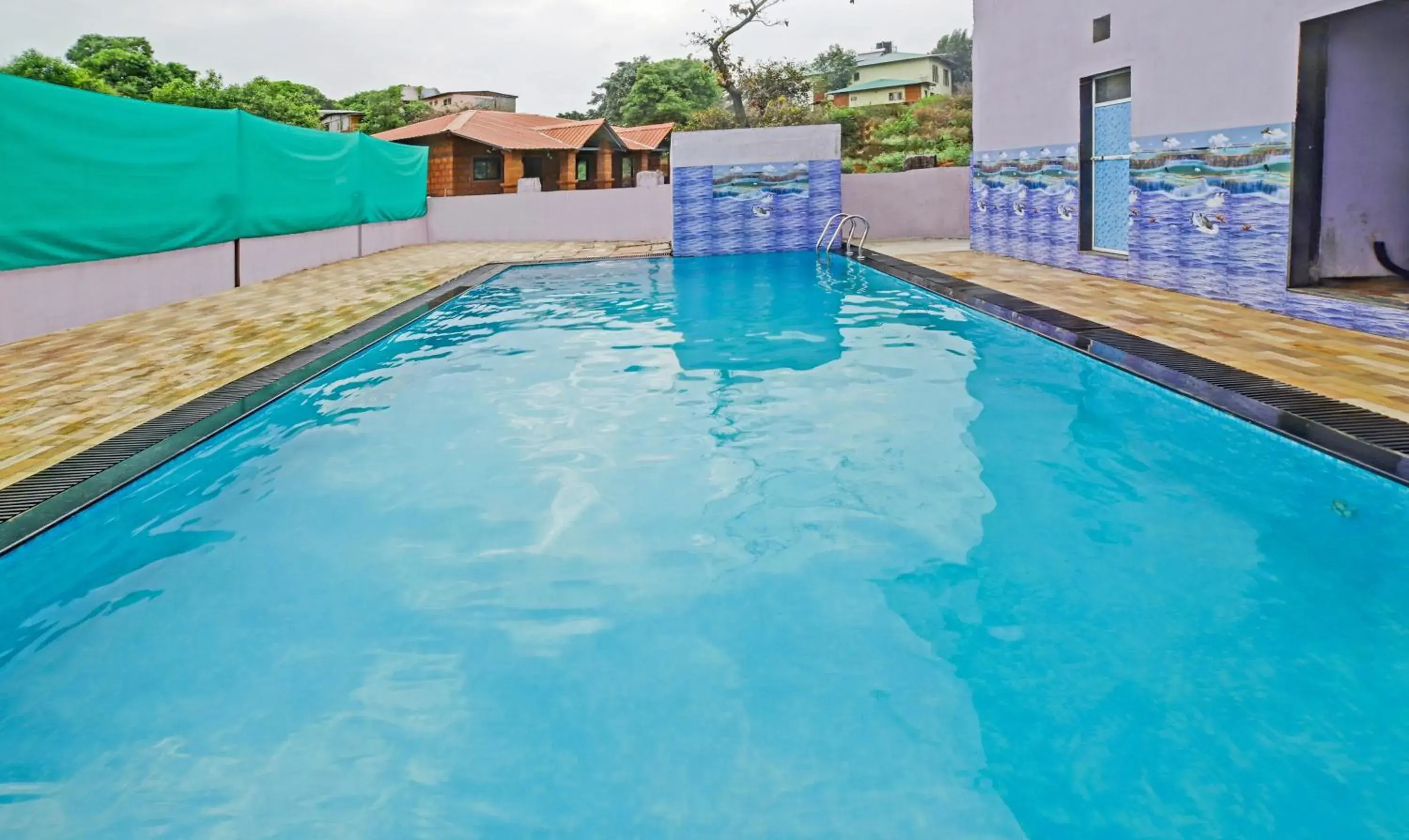 Swimming pool in Treebo Balaji Excellency with Pool & Spa Swimming pool in Treebo Balaji Excellency with Pool & Spa