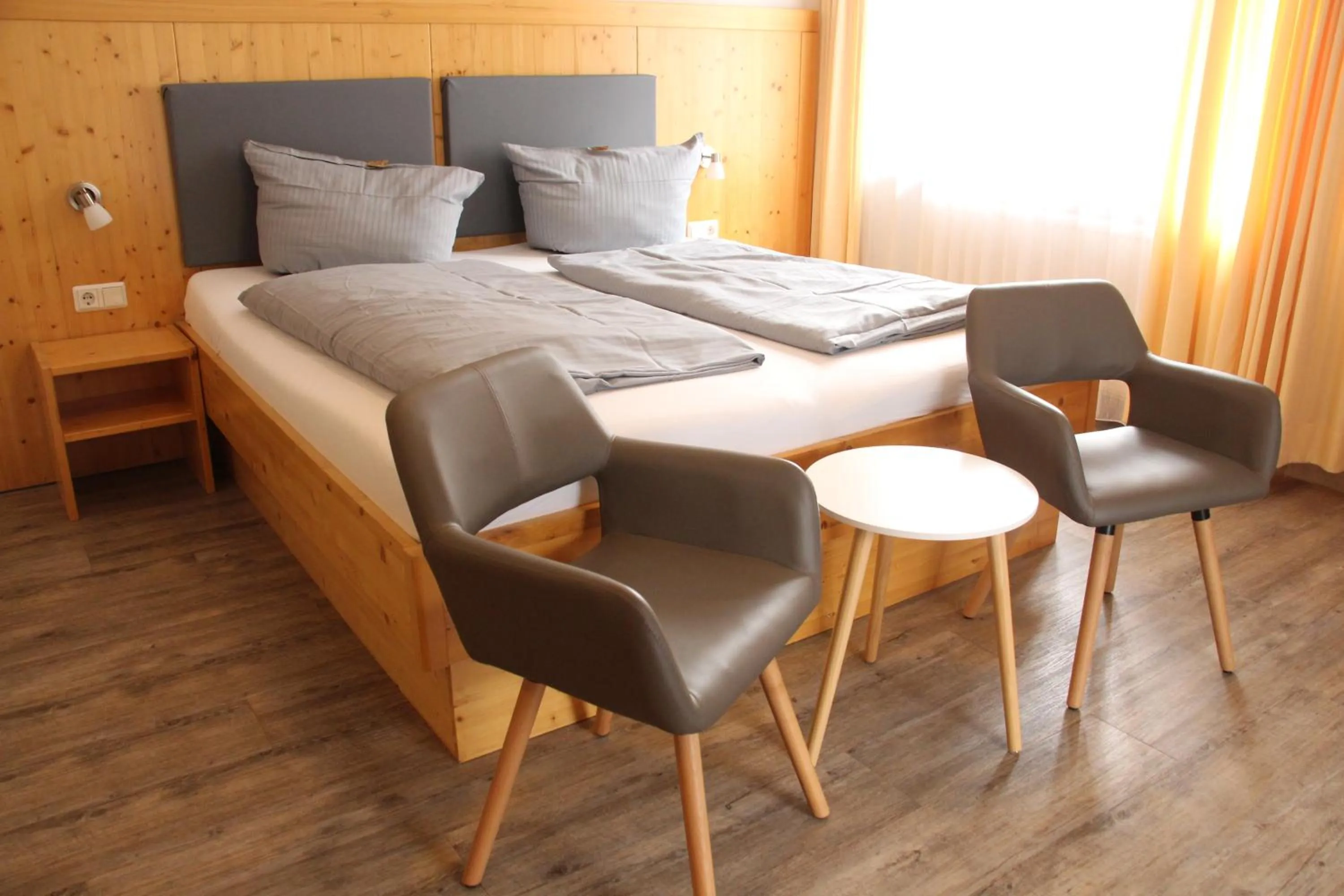 Bed in REGIOHOTEL Germania am Kurpark Bad Harzburg