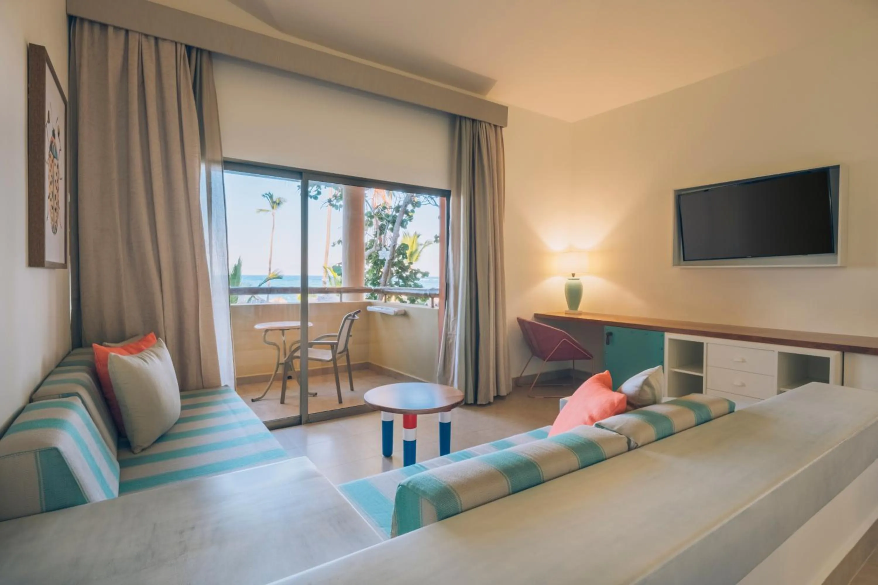 Living room, Bed in Iberostar Selection Bavaro Suites - All Inclusive