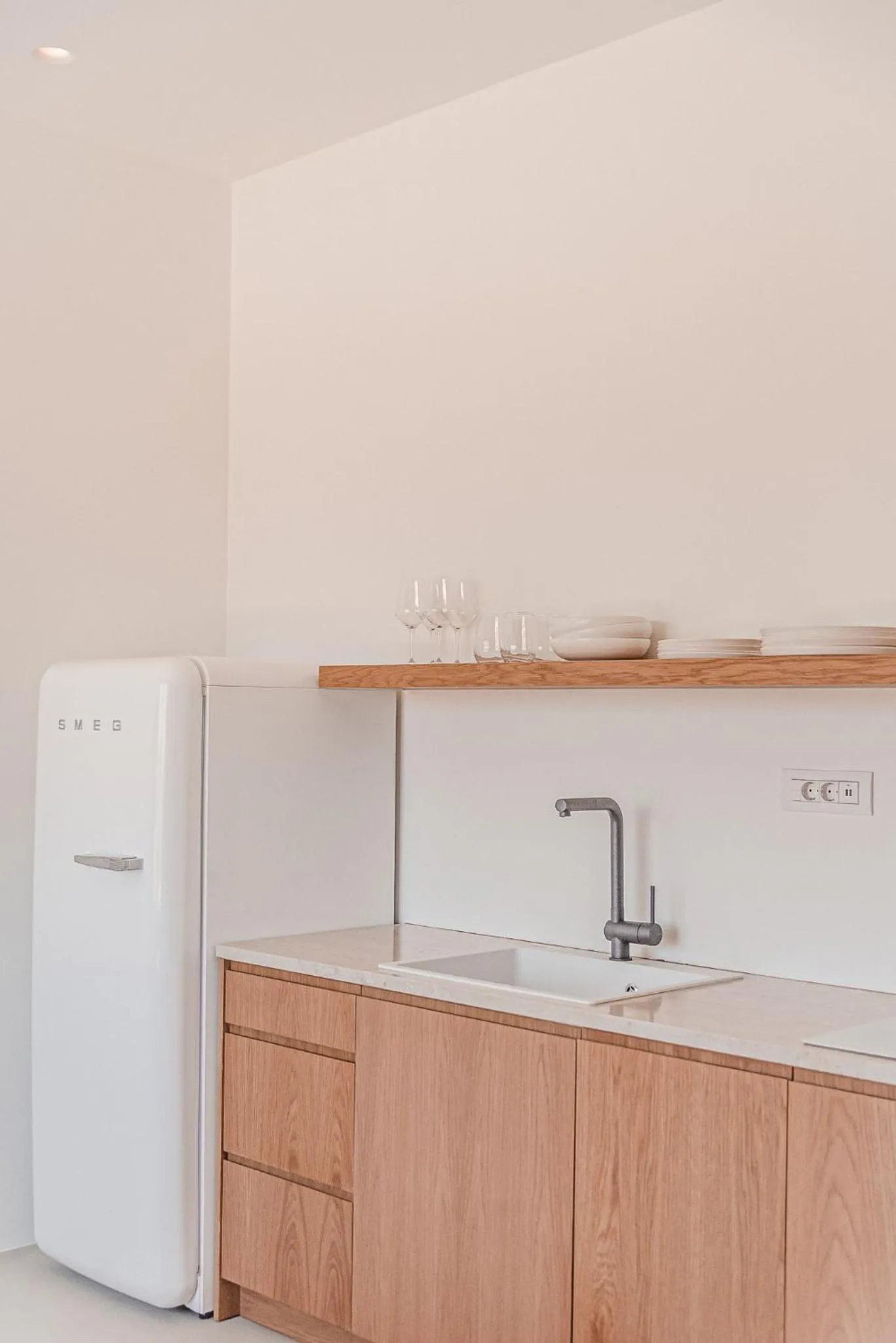 Kitchen or kitchenette in Amarelo Suites