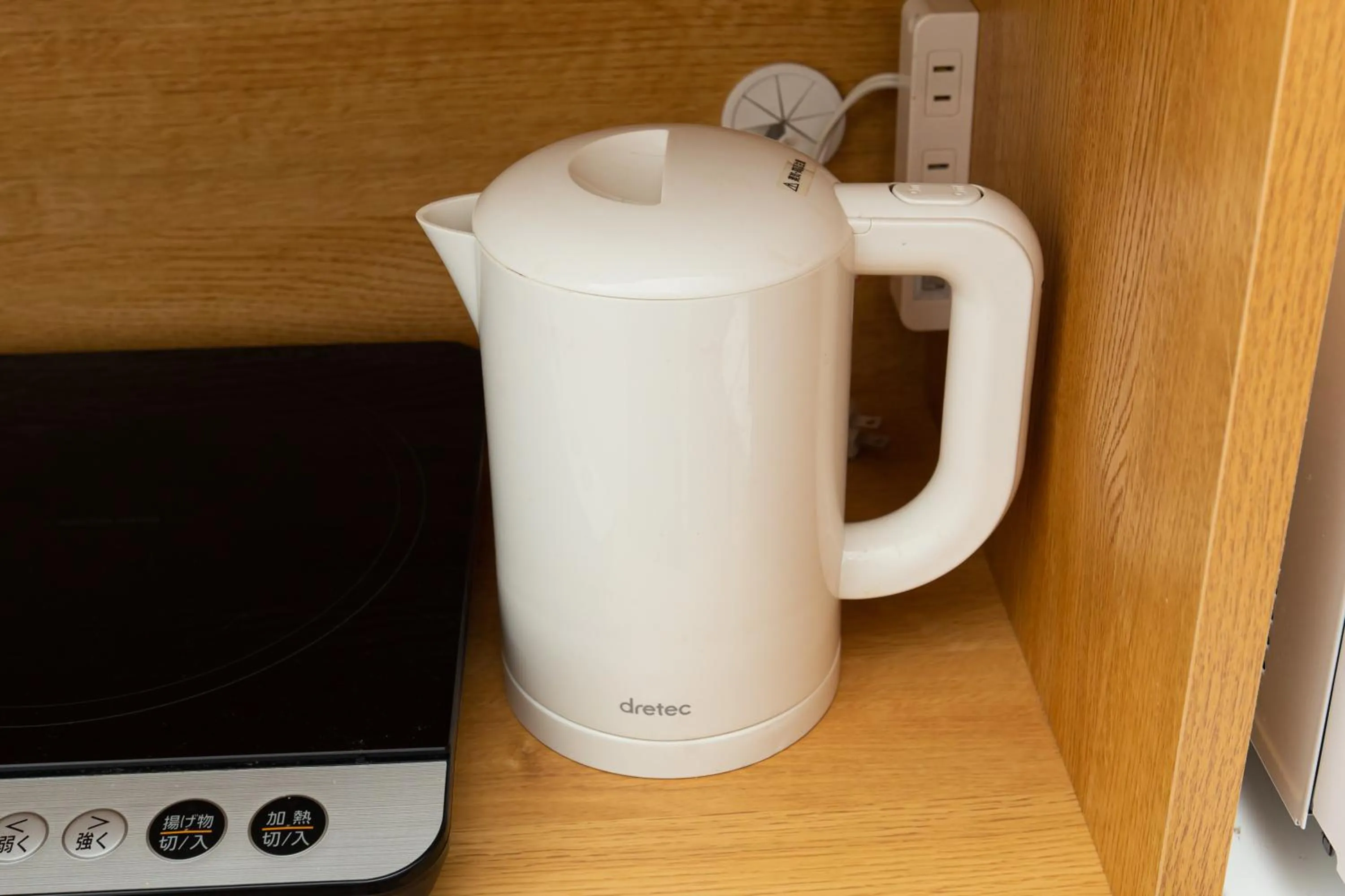 Kitchen or kitchenette in Wonderful Stay Tokyo Shinjuku