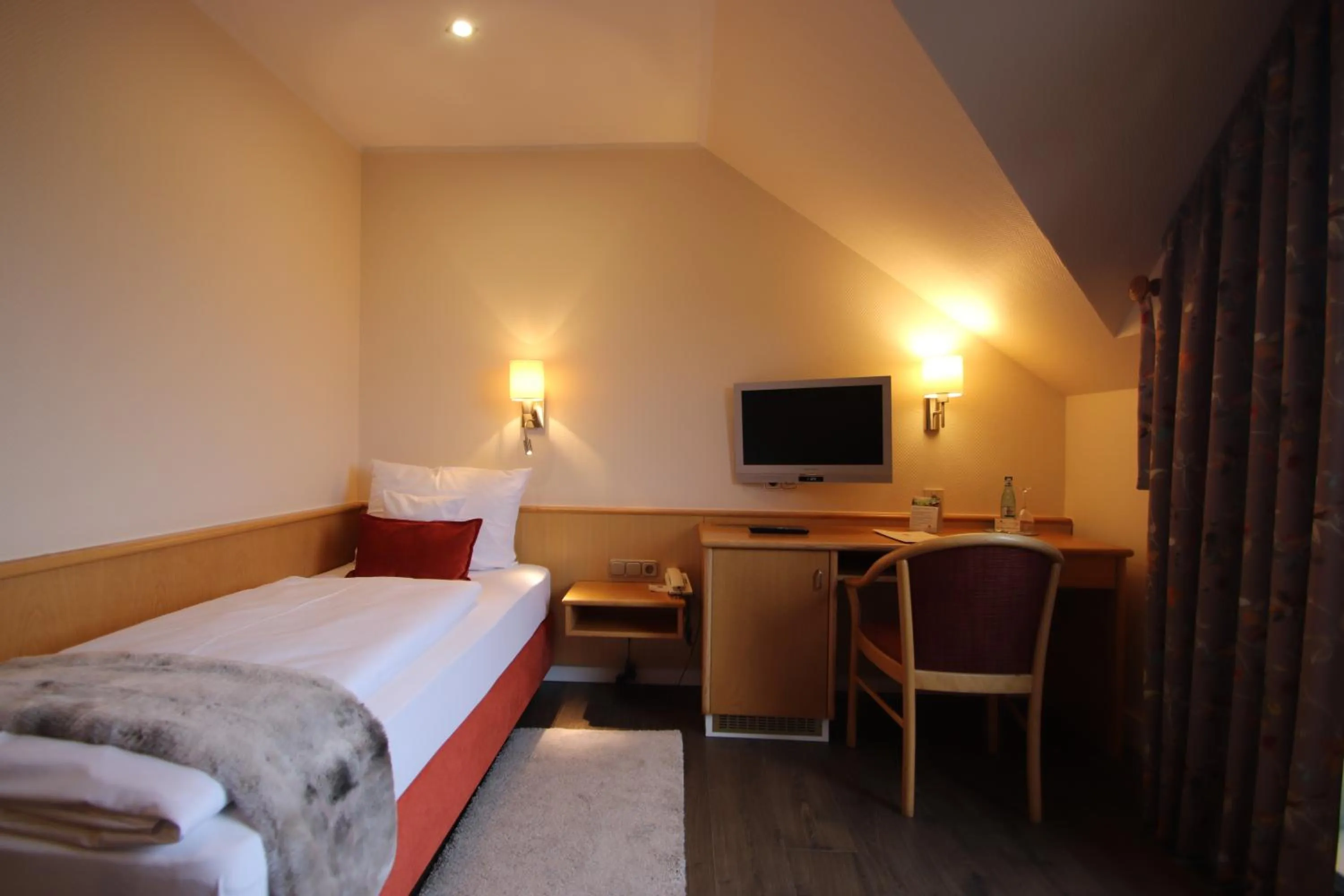 Bed in PANORAMA Hotel Heimbuchenthal