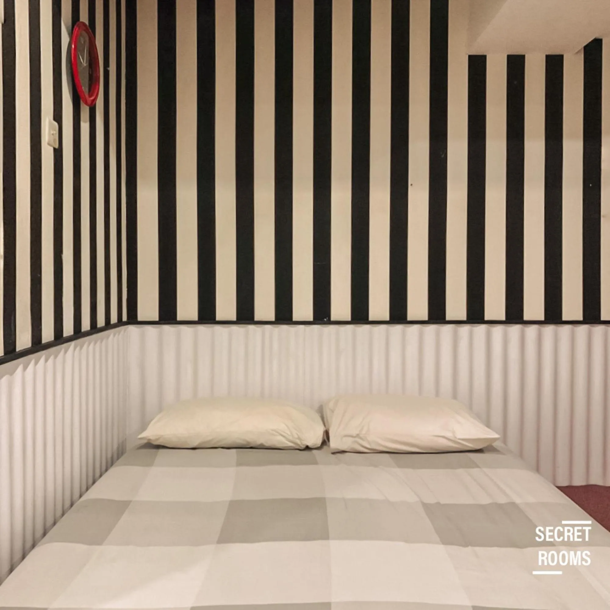 Bed in The Jarrdin Apartement by Secret Rooms