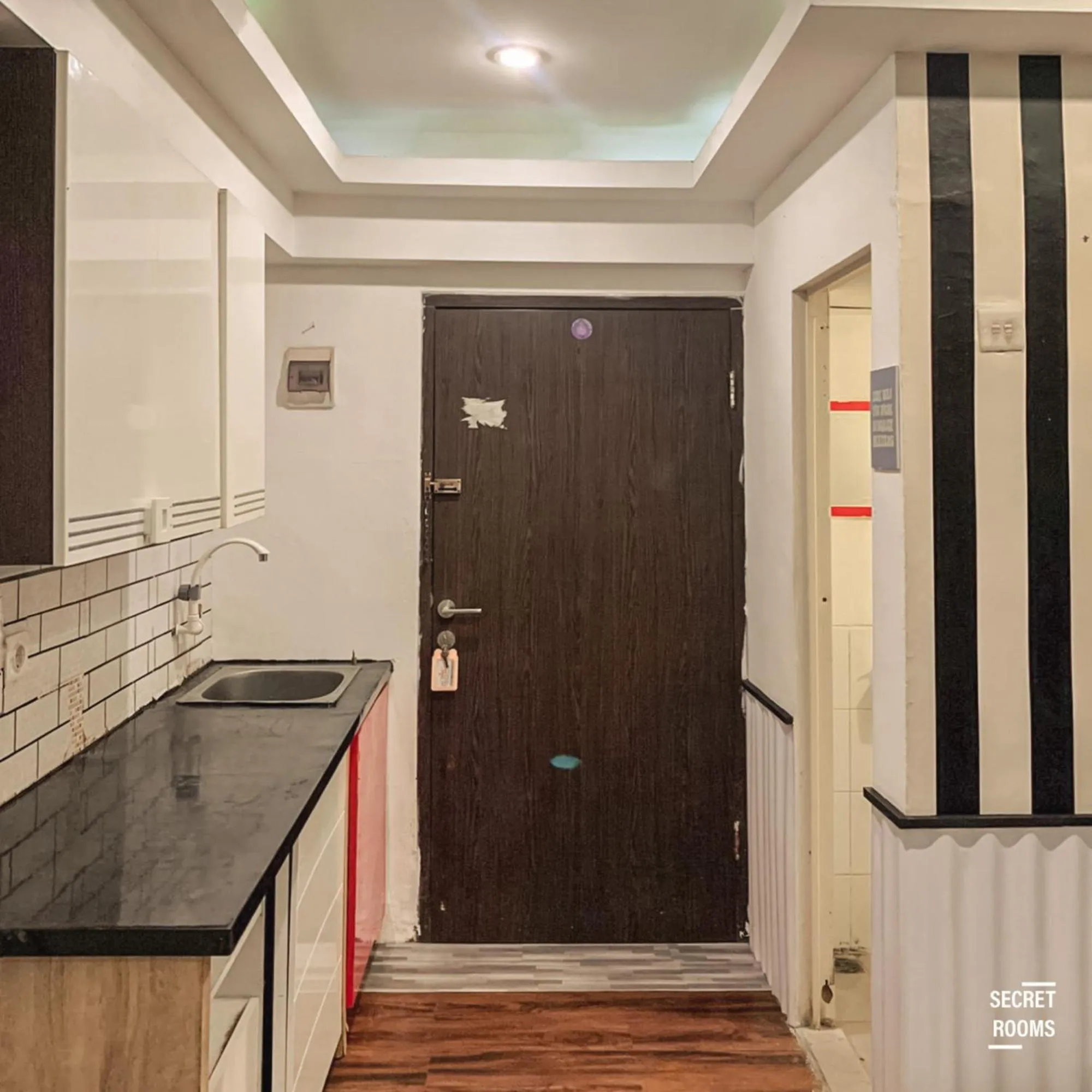 Kitchen or kitchenette in The Jarrdin Apartement by Secret Rooms