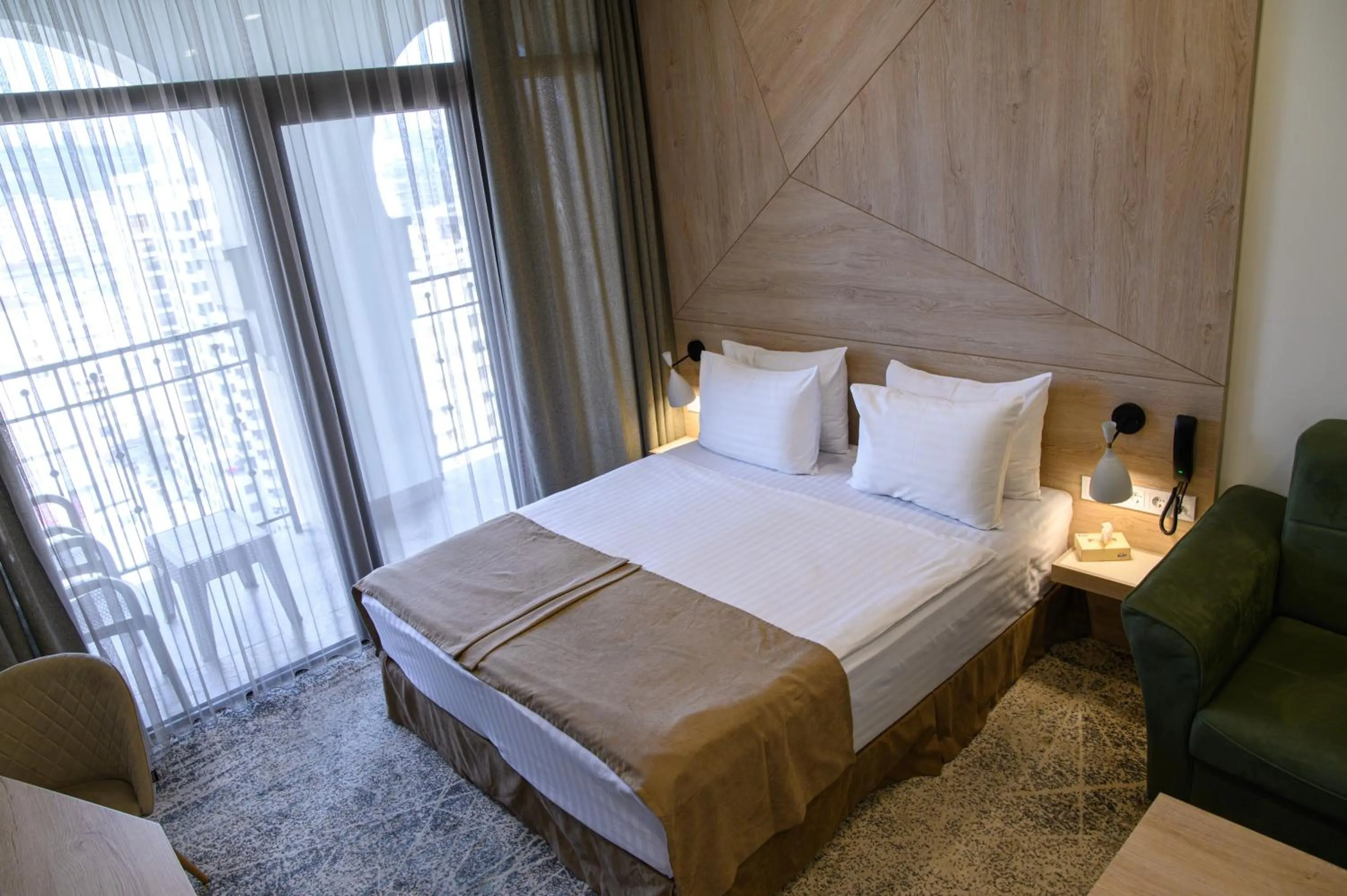 Bed in Rooftop Apart-Hotel