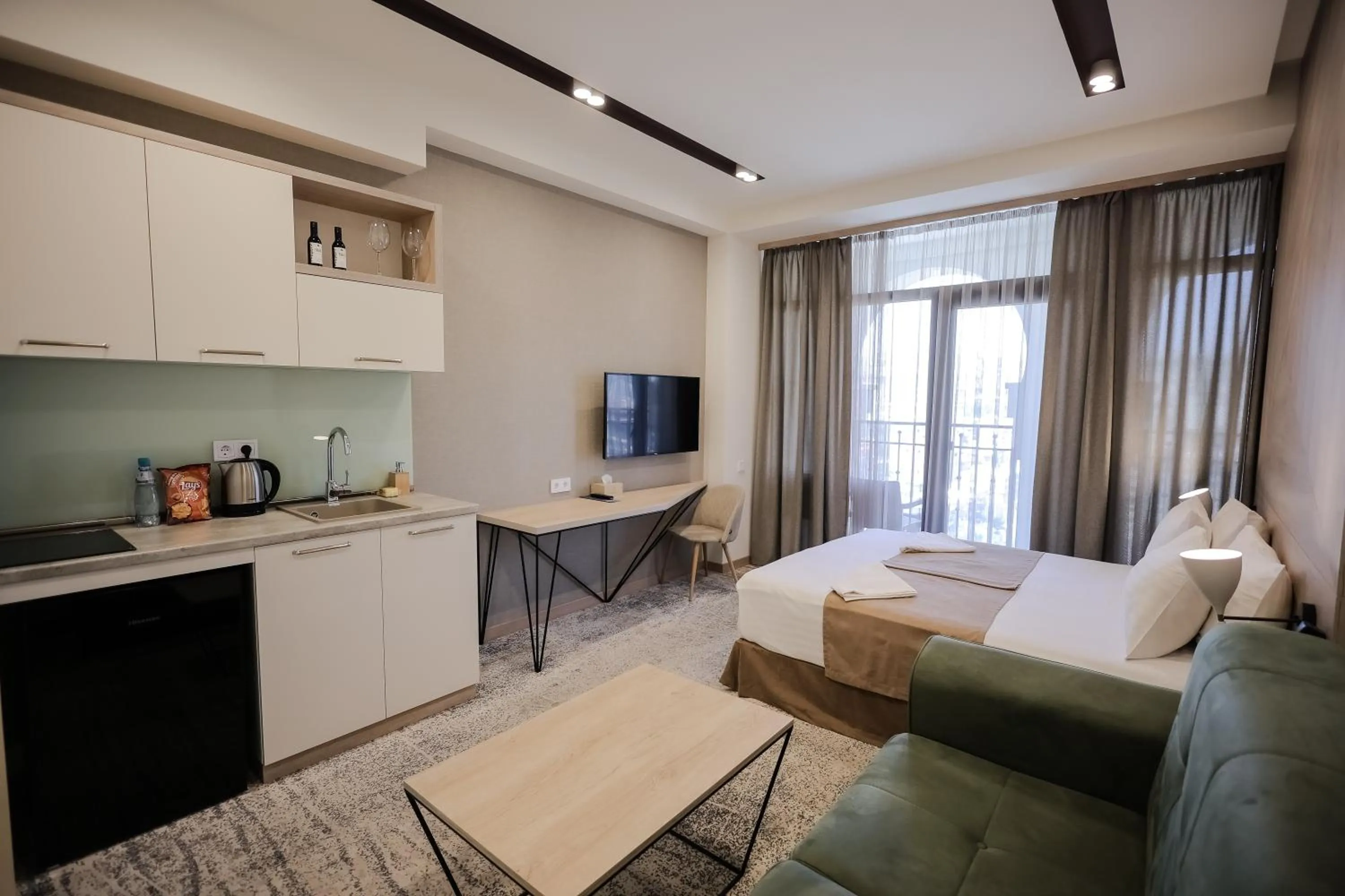 Photo of the whole room, Bed in Rooftop Apart-Hotel