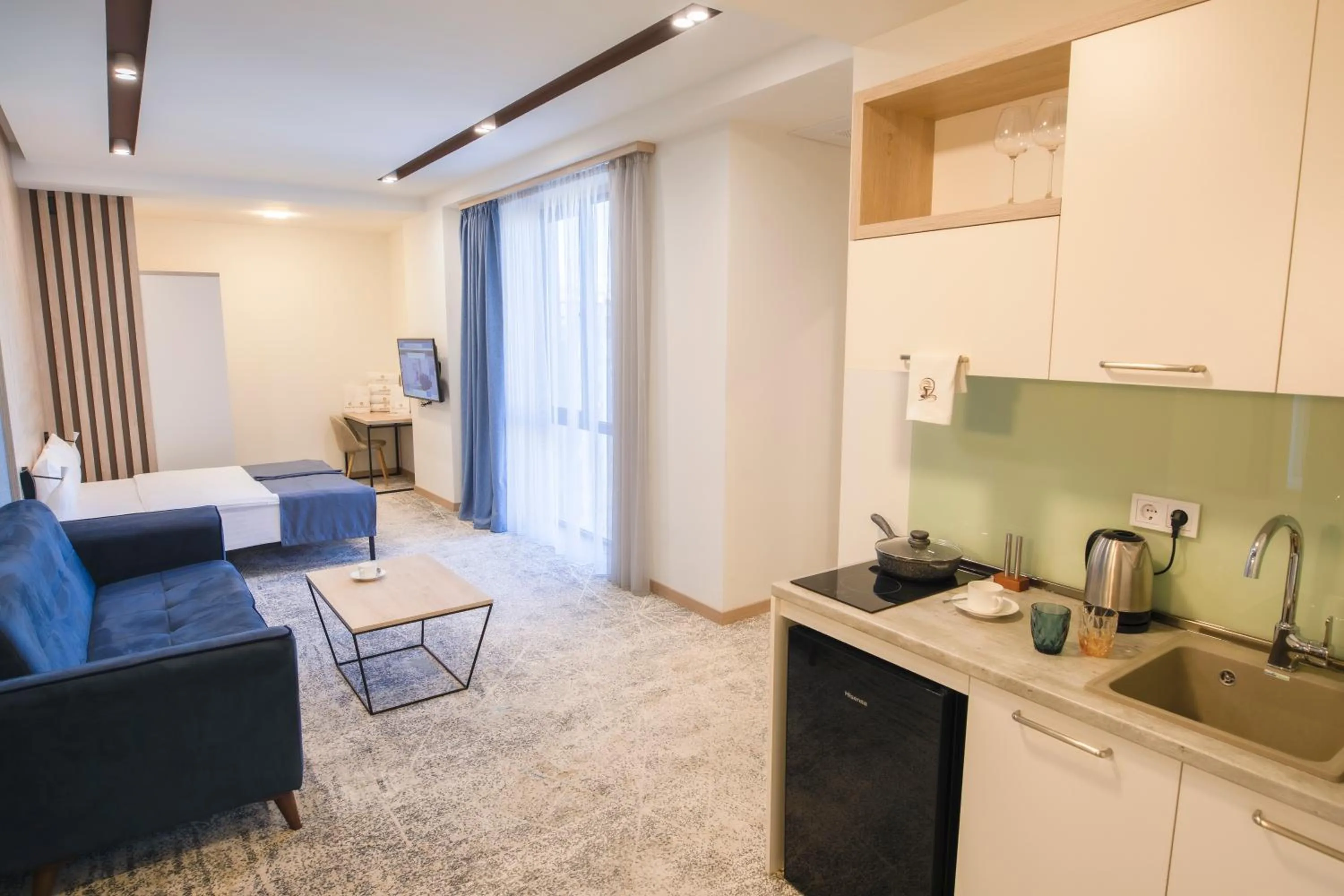 Kitchen or kitchenette in Rooftop Apart-Hotel