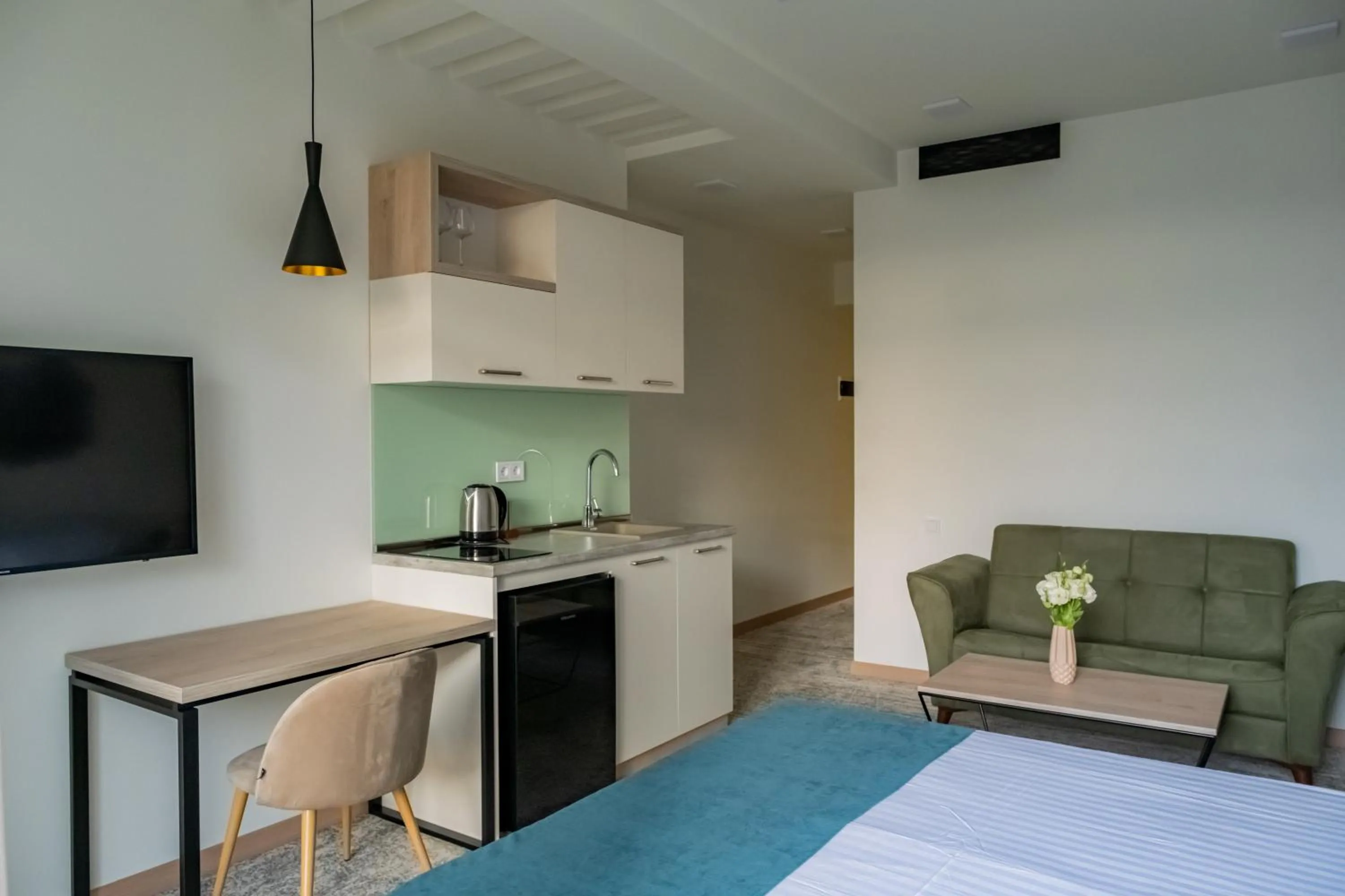 Kitchen or kitchenette in Rooftop Apart-Hotel
