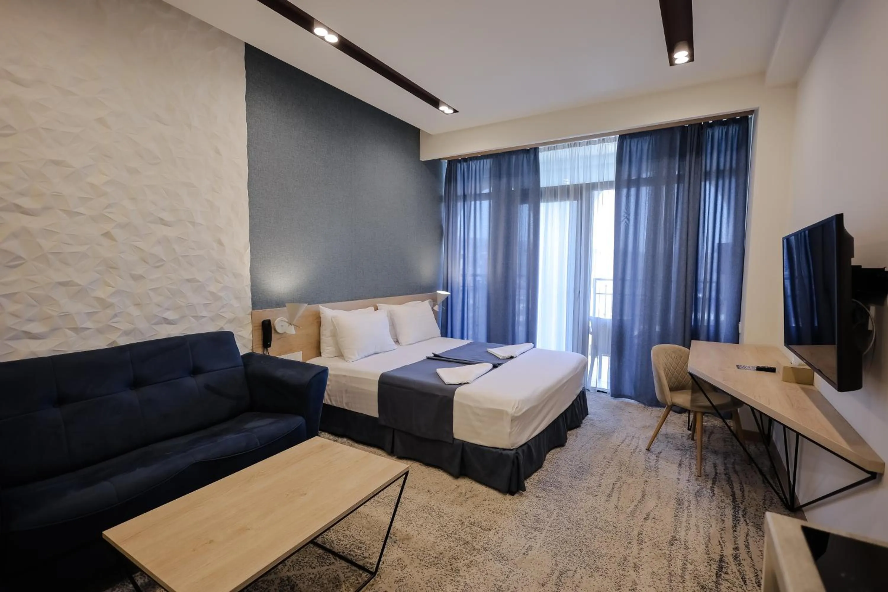 Photo of the whole room, Bed in Rooftop Apart-Hotel