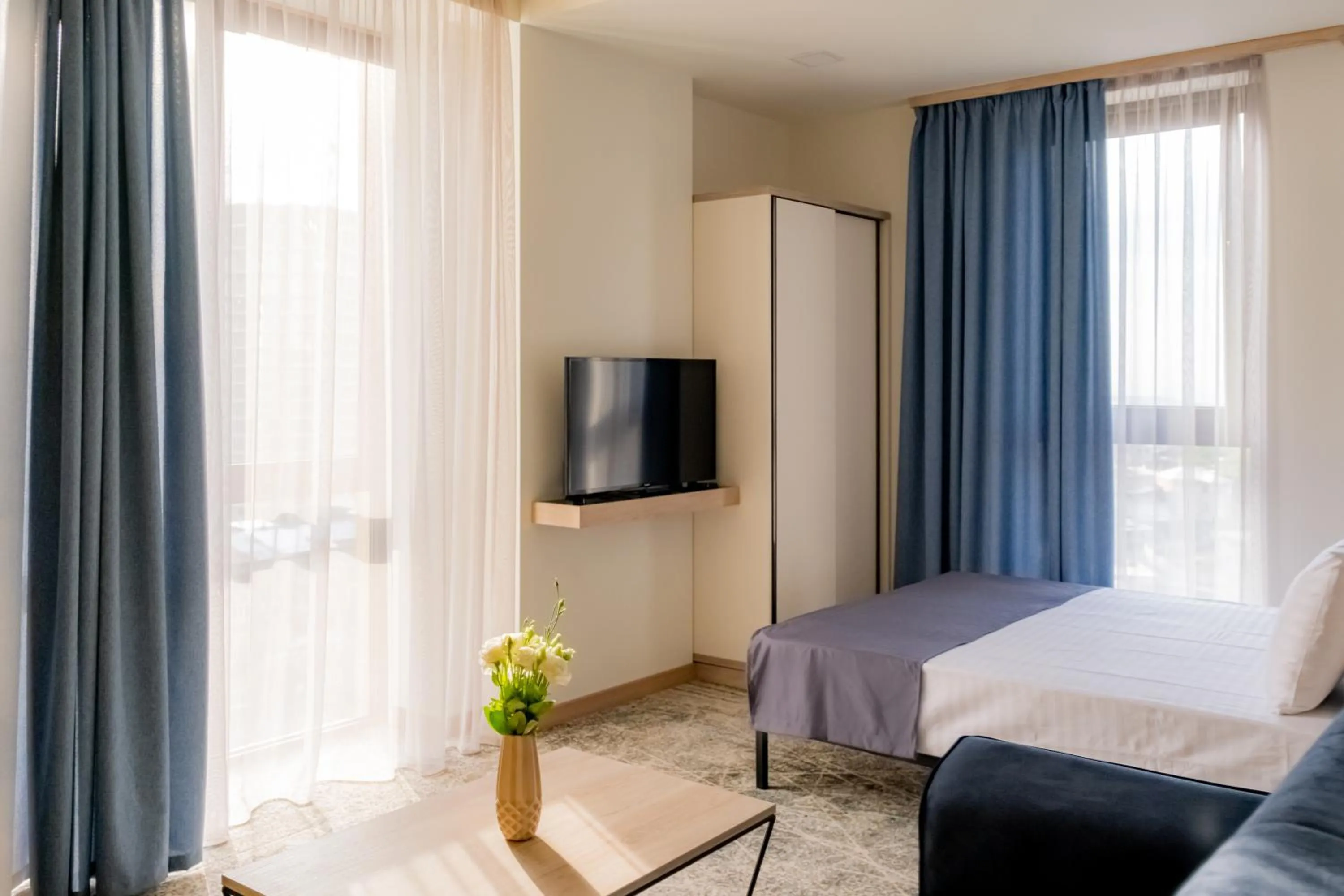 TV and multimedia, Bed in Rooftop Apart-Hotel