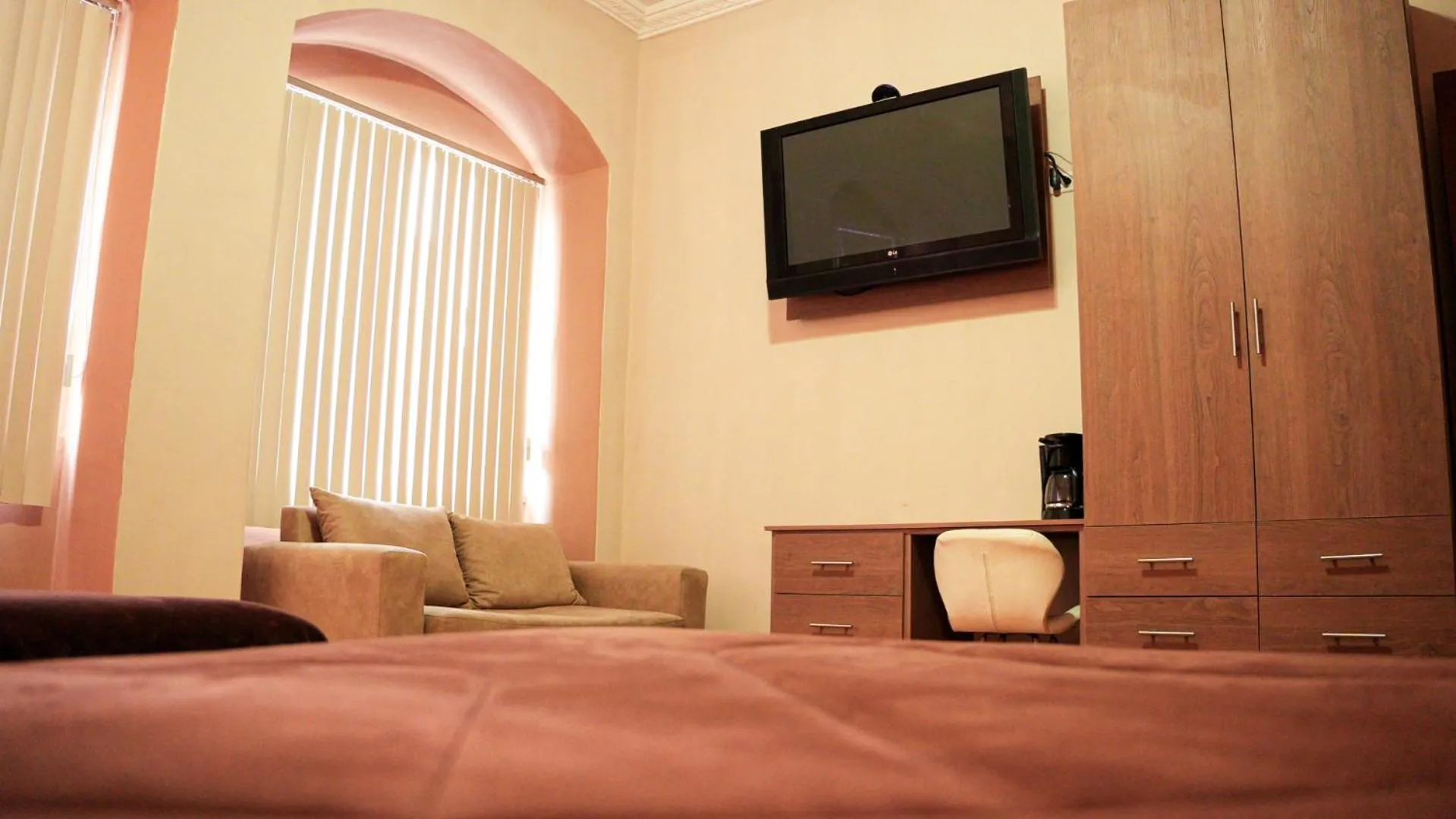 Bed in Hotel San Benito Cuenca