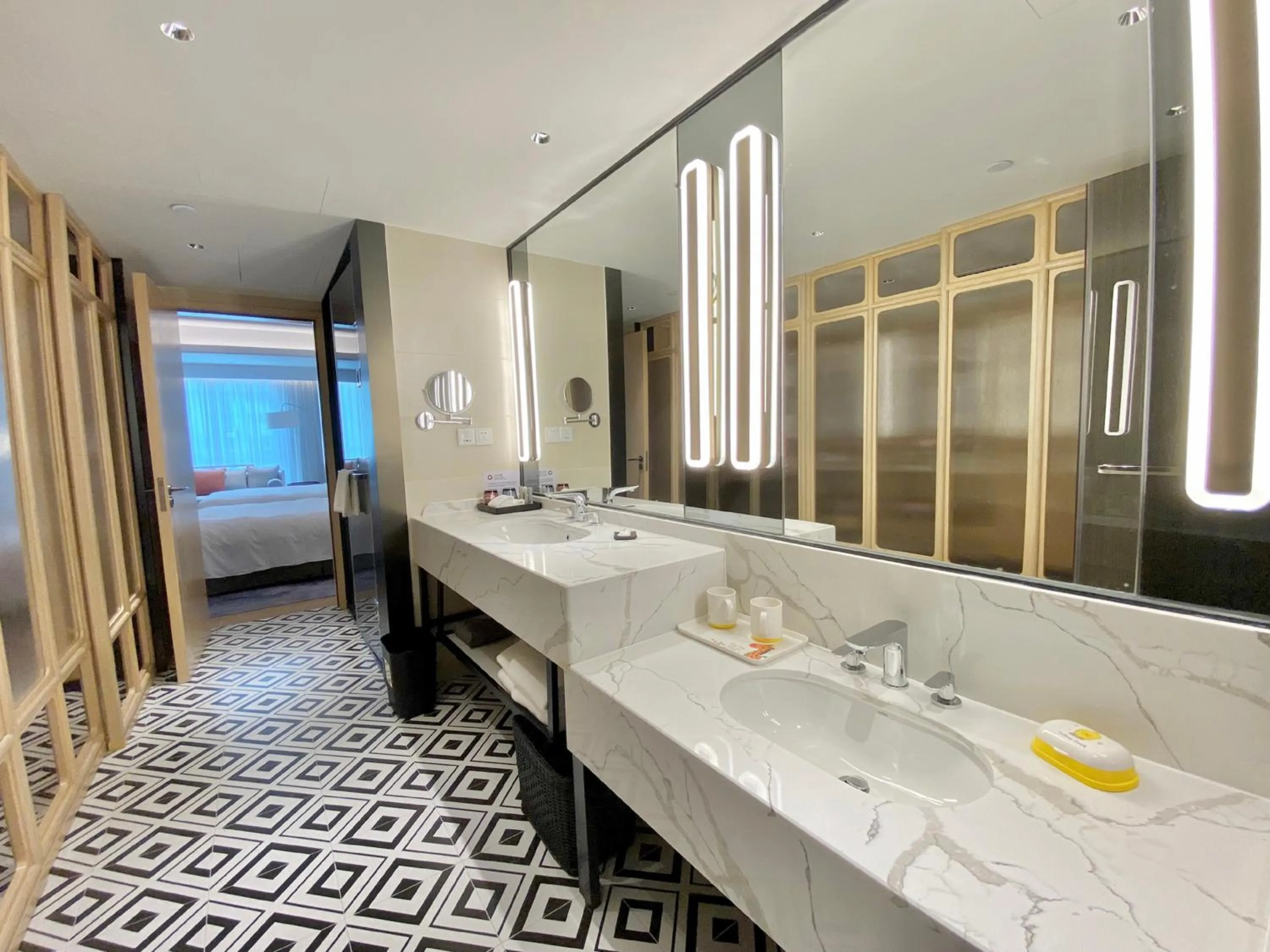 Toilet in voco Guangzhou Shifu by IHG