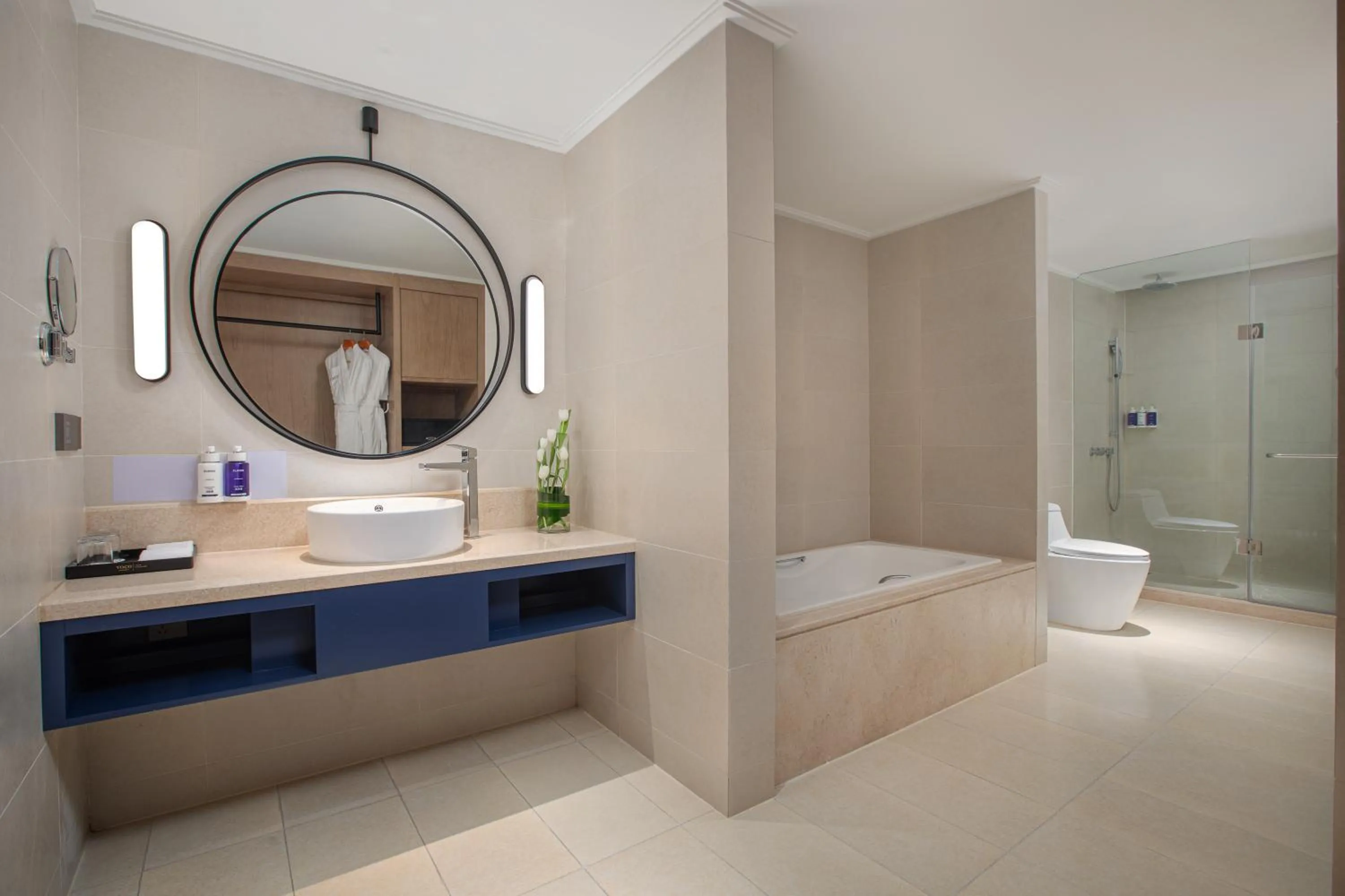 Toilet in voco Guangzhou Shifu by IHG