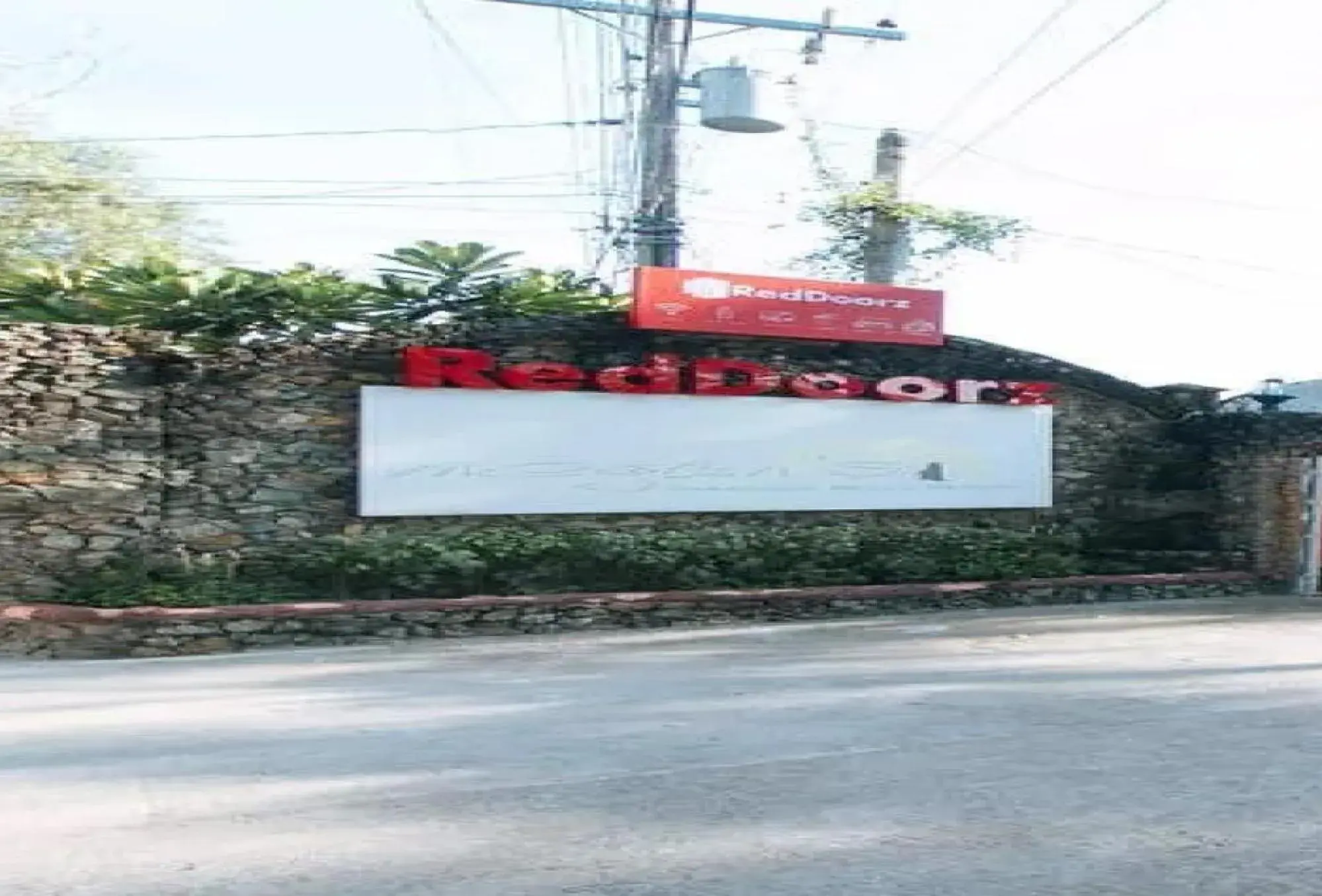 Property building in RedDoorz Hostel at Megans Paradisio Beach Resort Property building in RedDoorz Hostel at Megans Paradisio Beach Resort