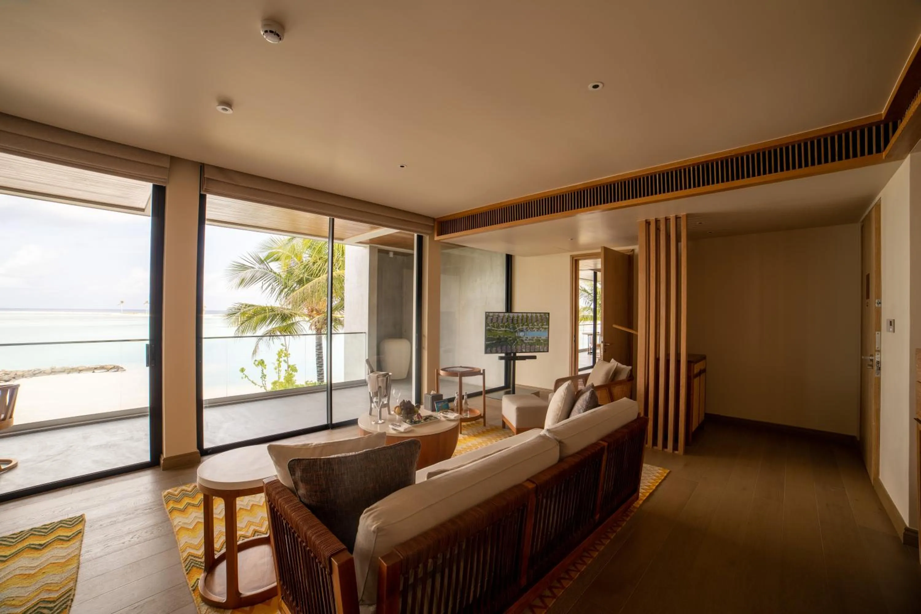 Seating area, Bed in Kuda Villingili Maldives, Free Return Transfers 03 nights & above