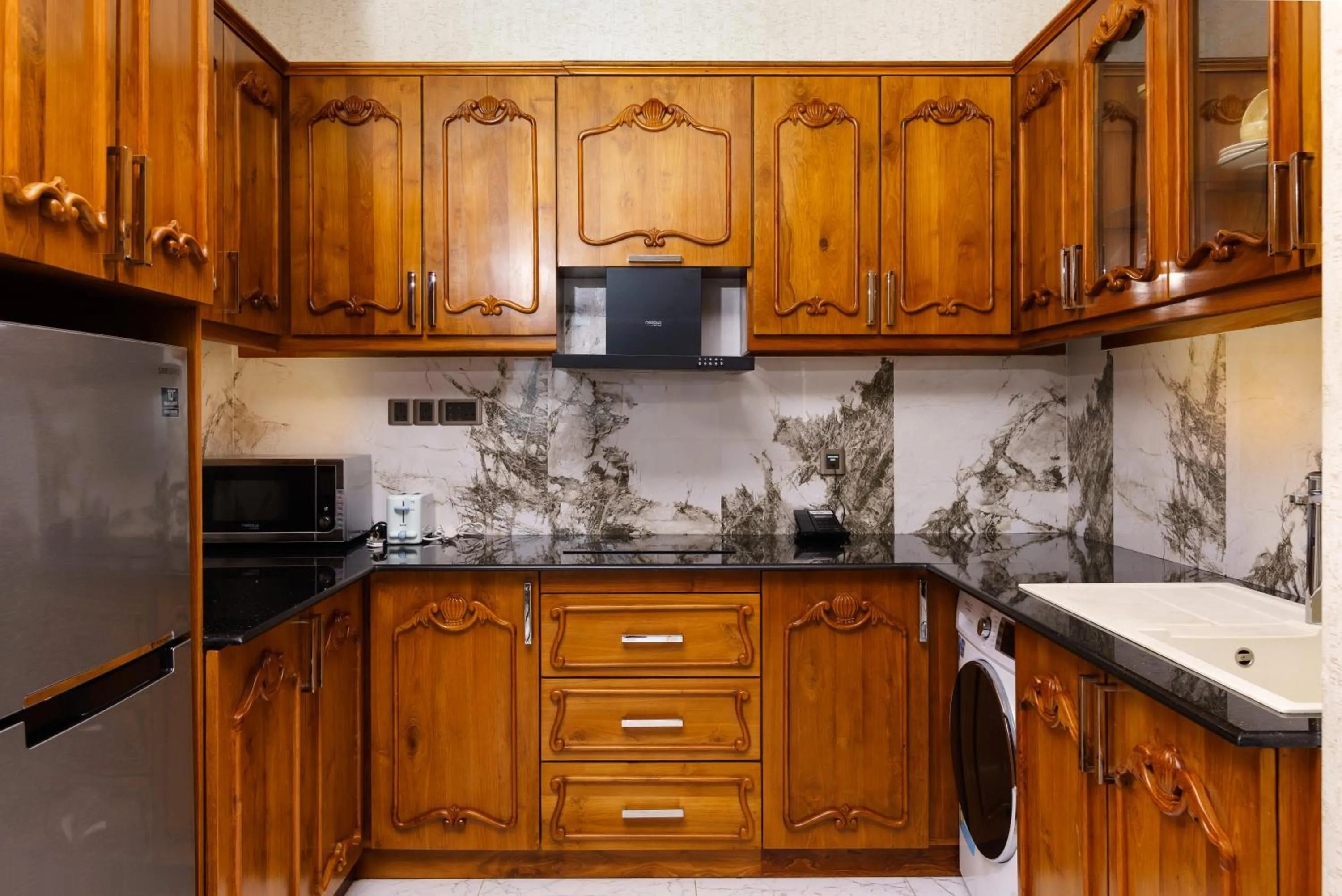 Kitchen or kitchenette in Araliya Beach Resort & Spa Unawatuna- Where you meet the sea all year