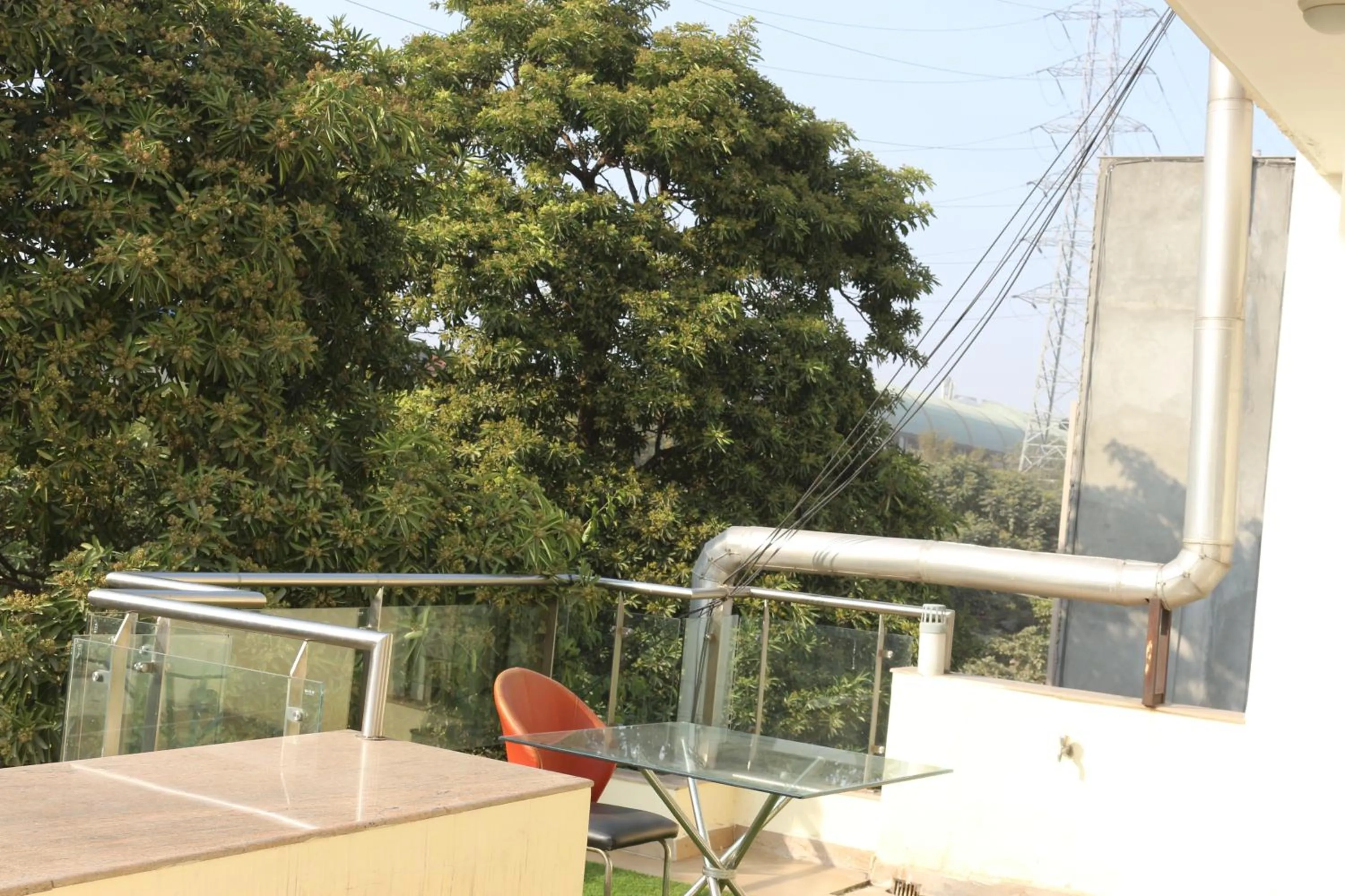 Balcony/Terrace in Lime Tree Hotel Sushant Lok Gurgaon Sector 29 Next to IFFCO CHOWK metro