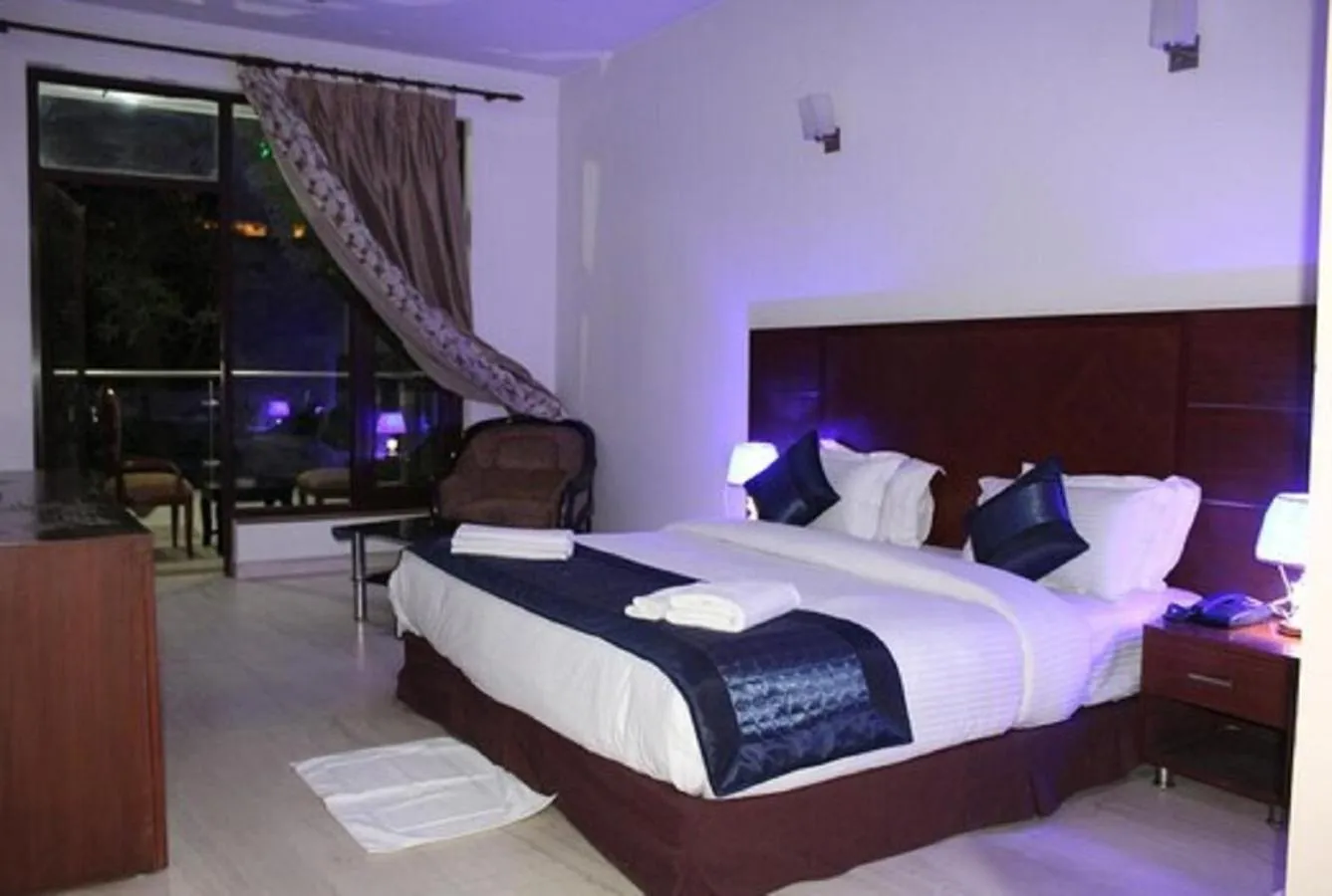 Bedroom, Bed in Lime Tree Hotel Sushant Lok Gurgaon Sector 29 Next to IFFCO CHOWK metro