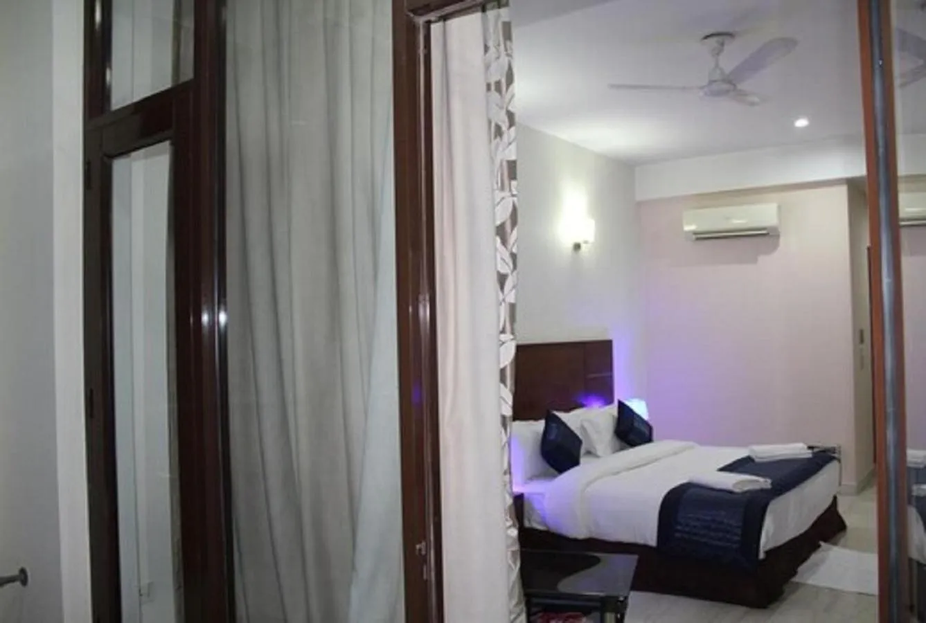 View (from property/room), Bed in Lime Tree Hotel Sushant Lok Gurgaon Sector 29 Next to IFFCO CHOWK metro