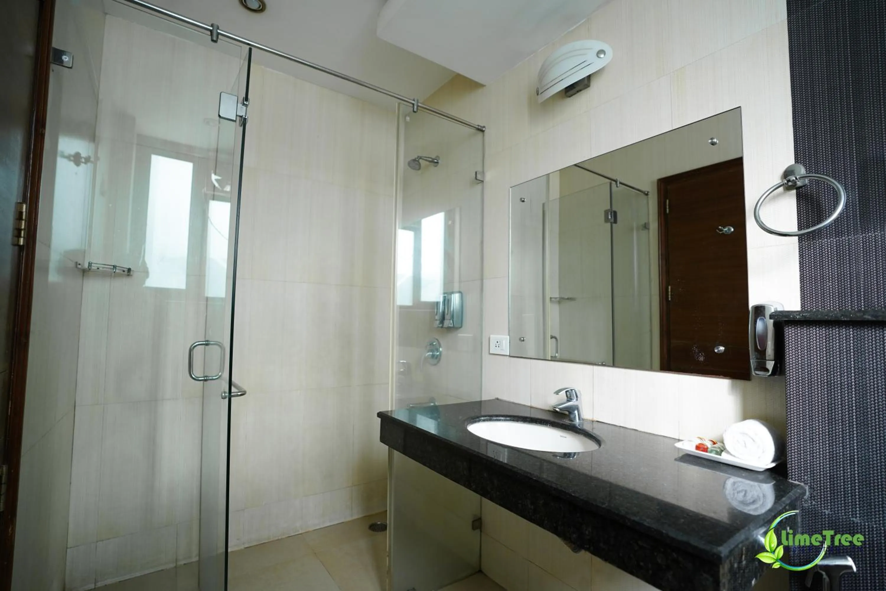 Bathroom in Lime Tree Hotel Sushant Lok Gurgaon Sector 29 Next to IFFCO CHOWK metro