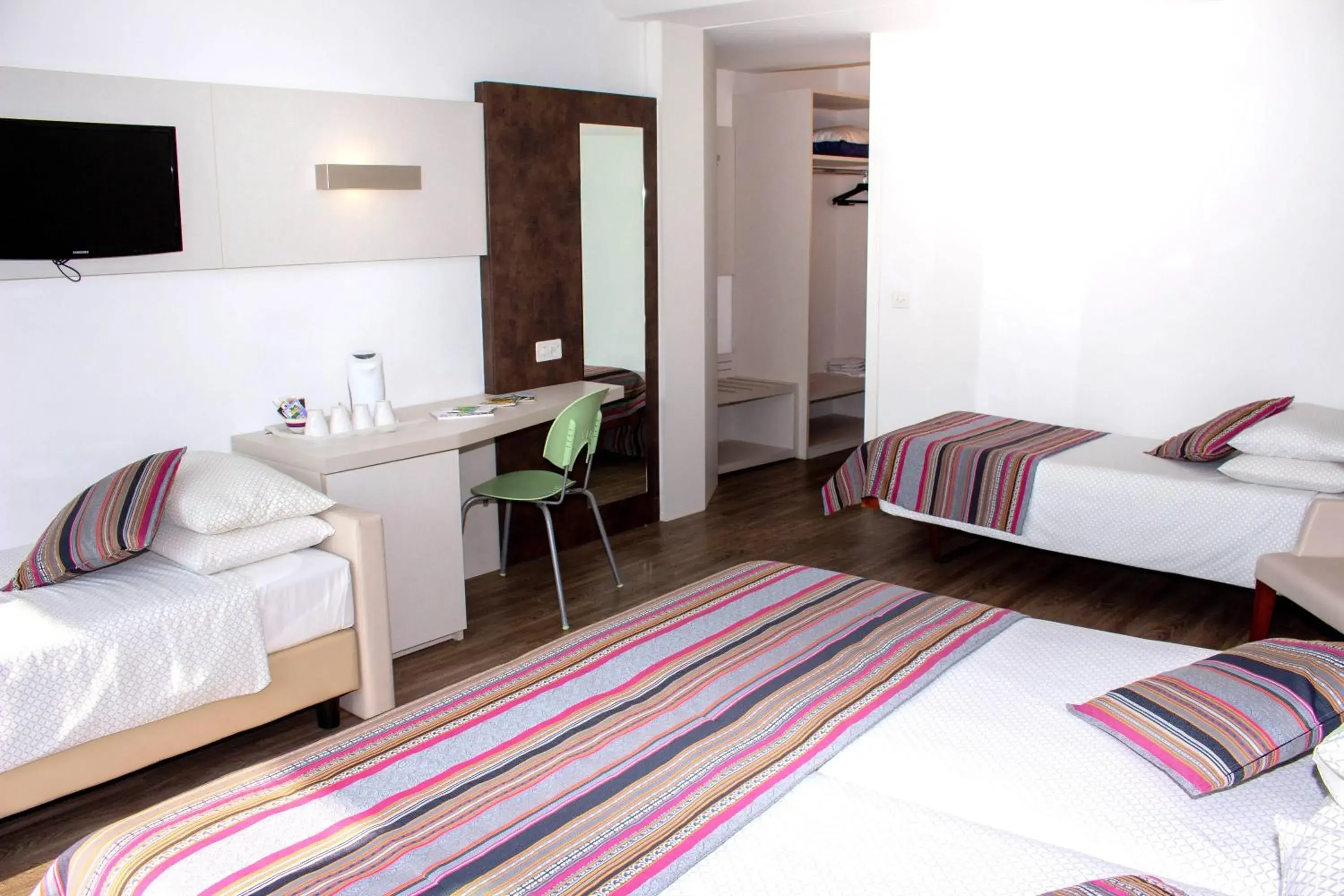 Quadruple Room with Balcony in Colorado Hotel Quadruple Room with Balcony in Colorado Hotel