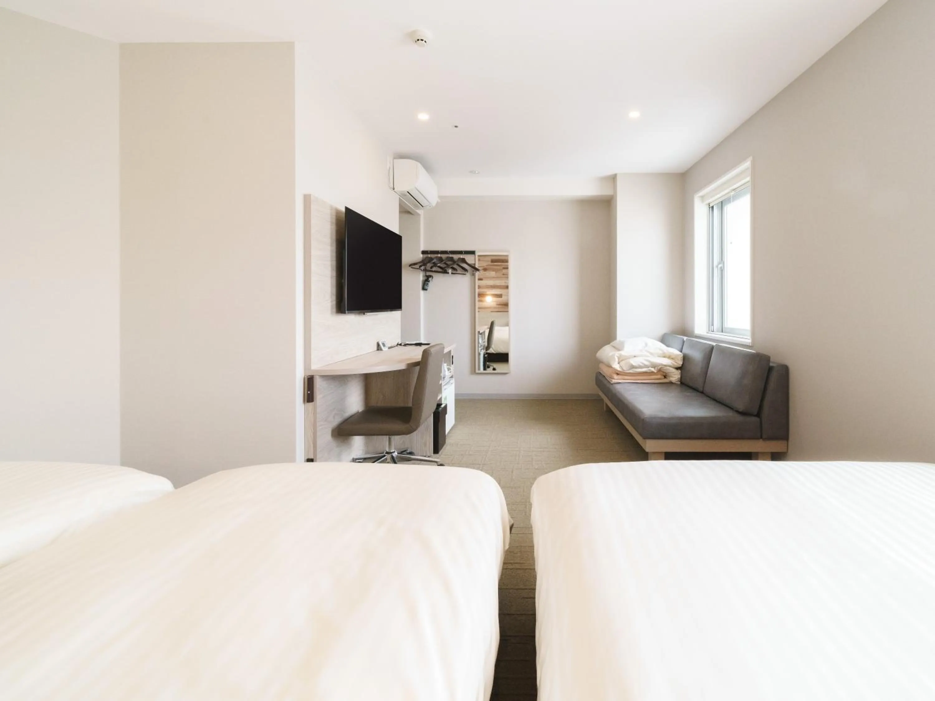 Bed in Super Hotel Kyoto Shijokawaramachi