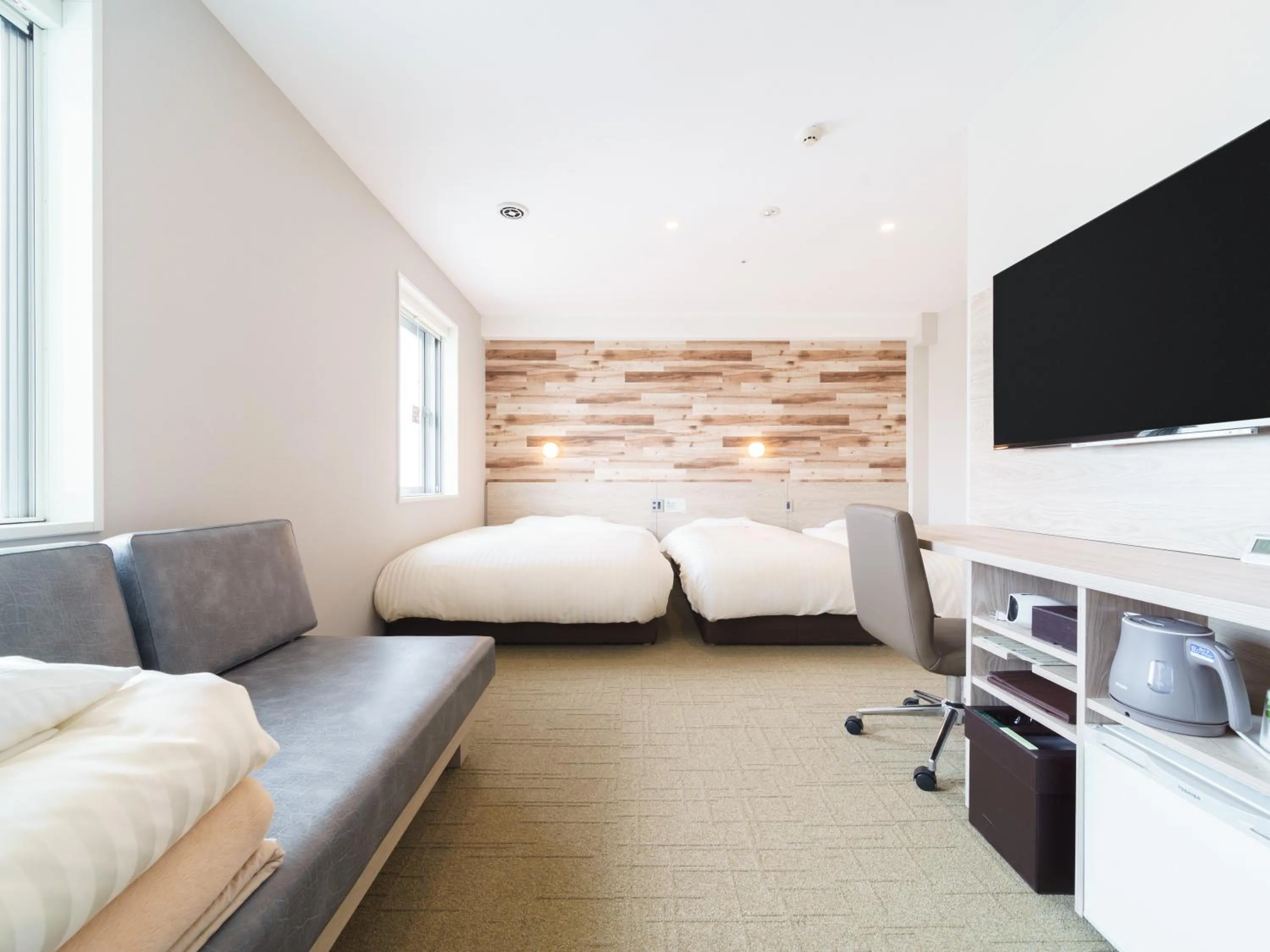 Bed in Super Hotel Kyoto Shijokawaramachi