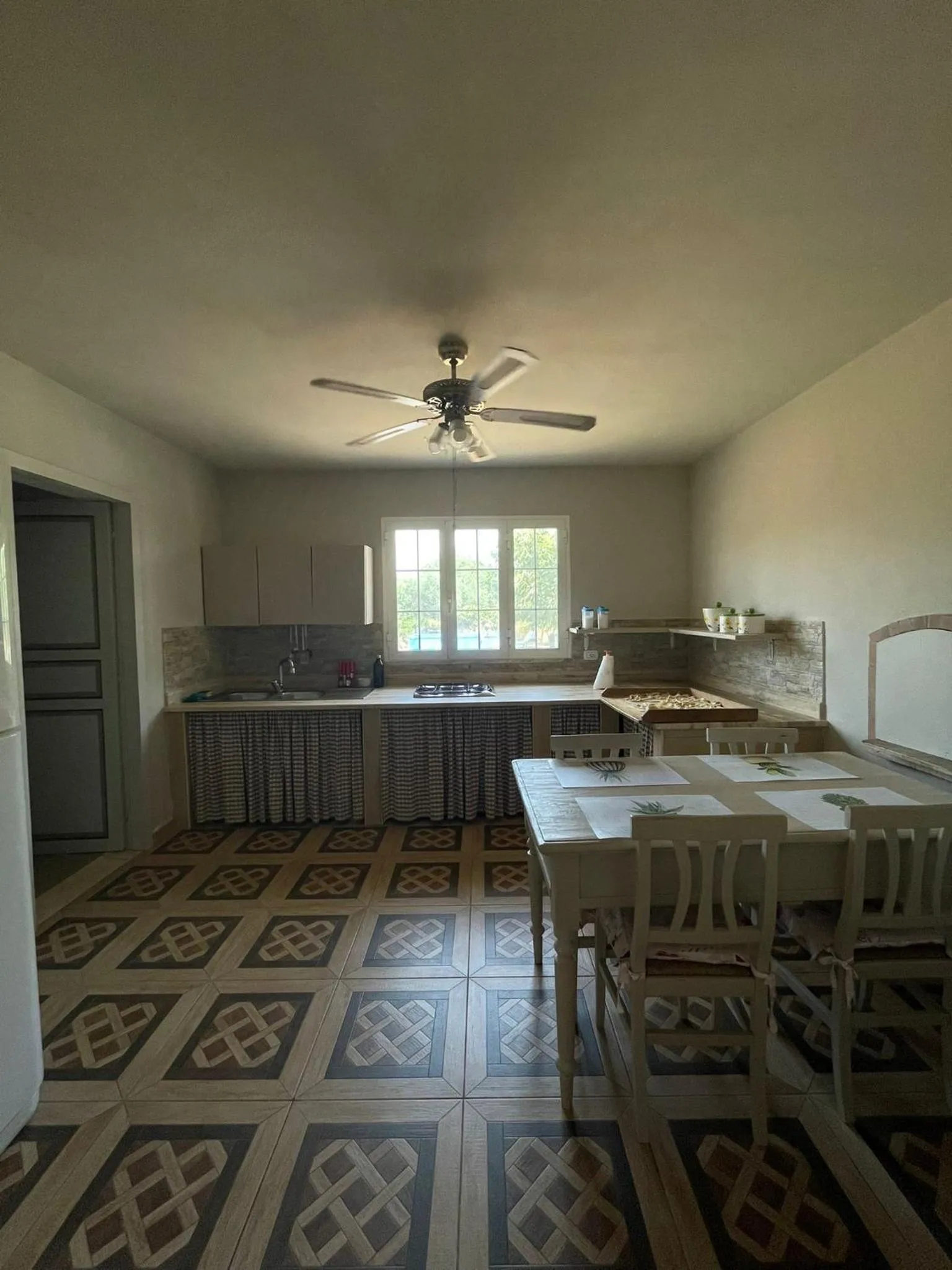 Kitchen or kitchenette in B&B Le Carrube