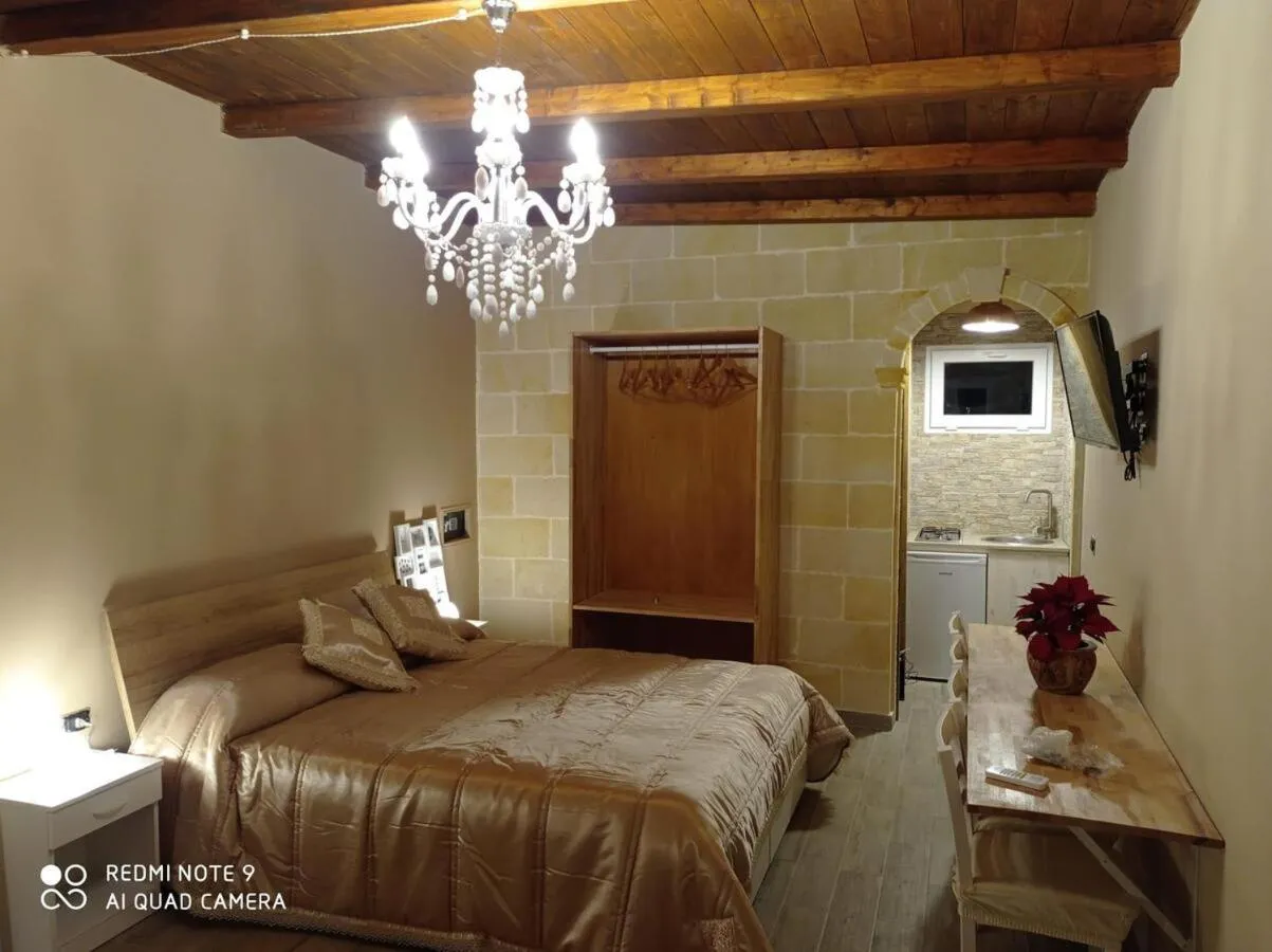 Bed in B&B Le Carrube