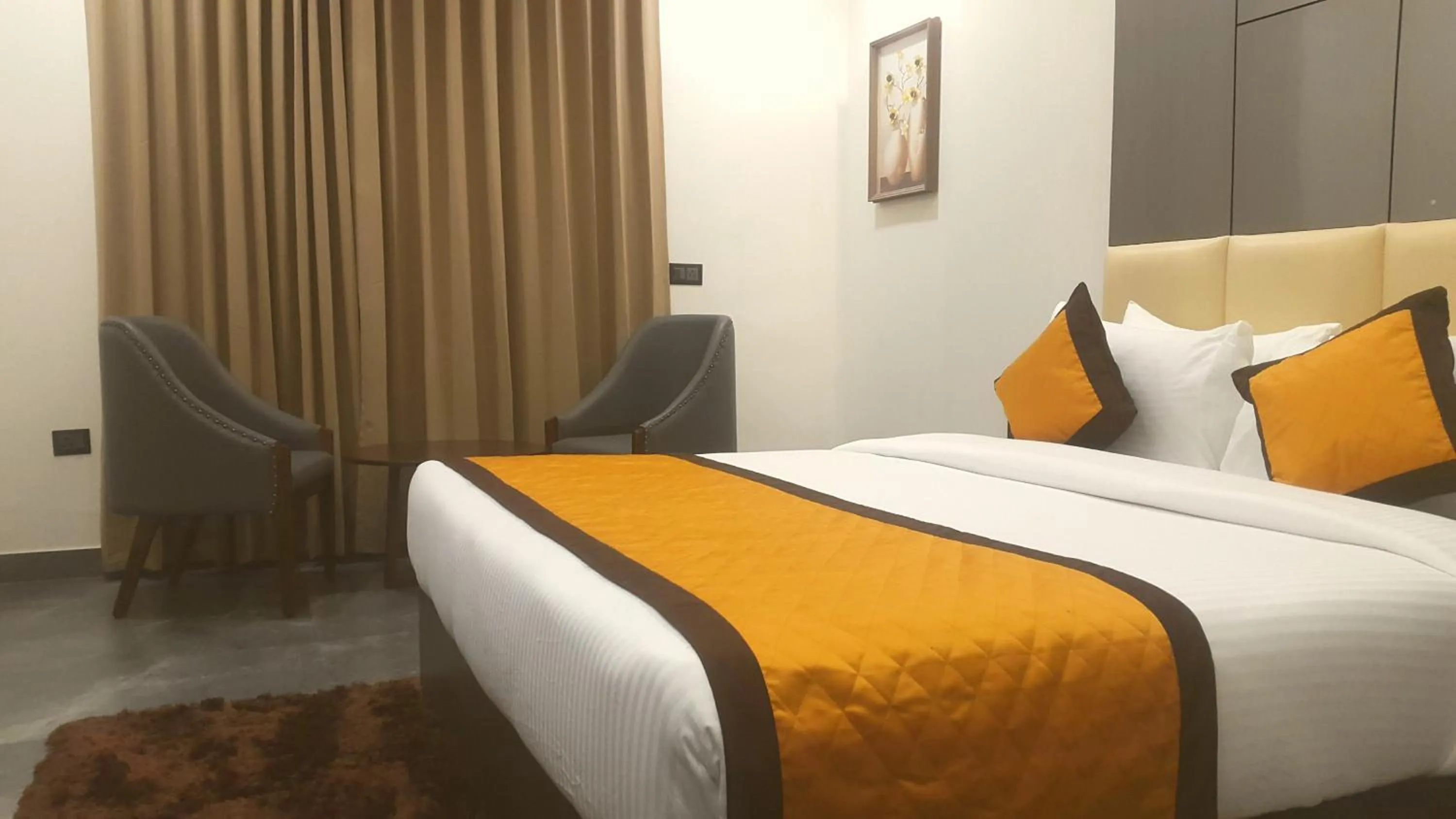 Photo of the whole room, Bed in Hotel Aksh Inn