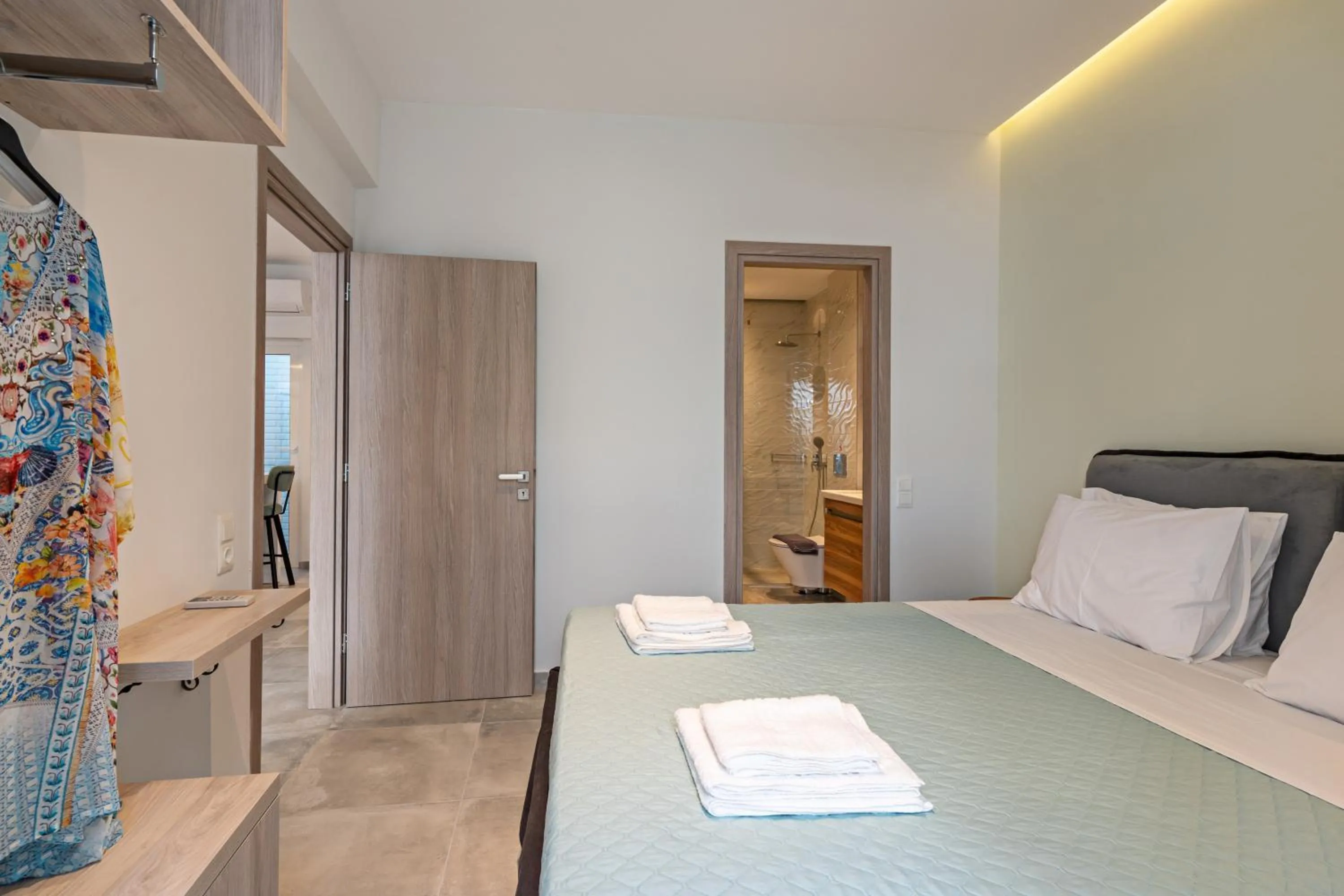 Bed in City and Sand Suites