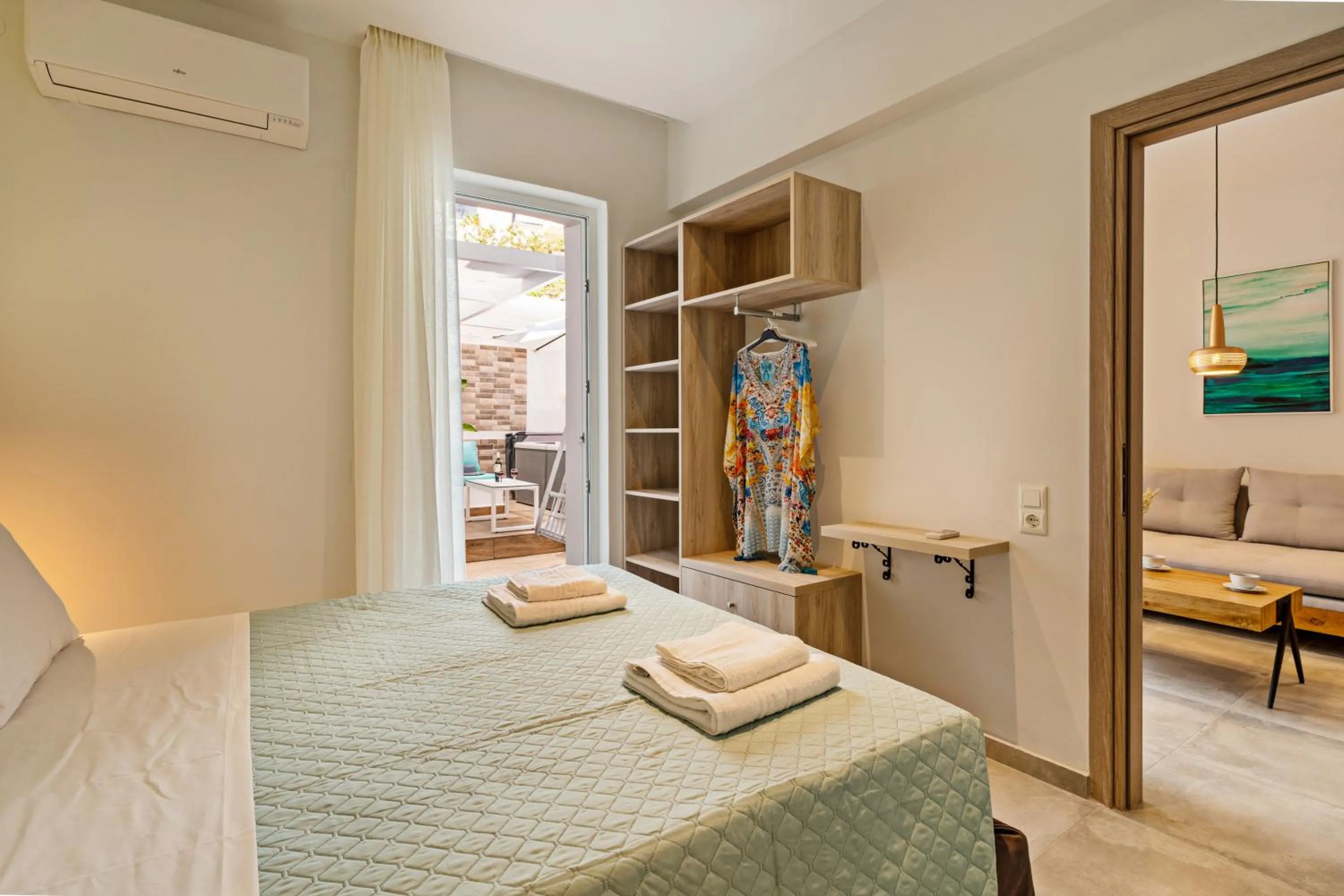 Bed in City and Sand Suites